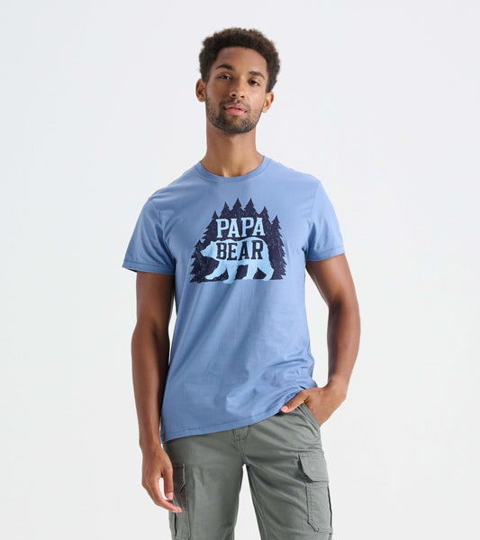 Light blue men's t-shirt featuring a bear and tree graphic, short sleeves, and a relaxed fit.