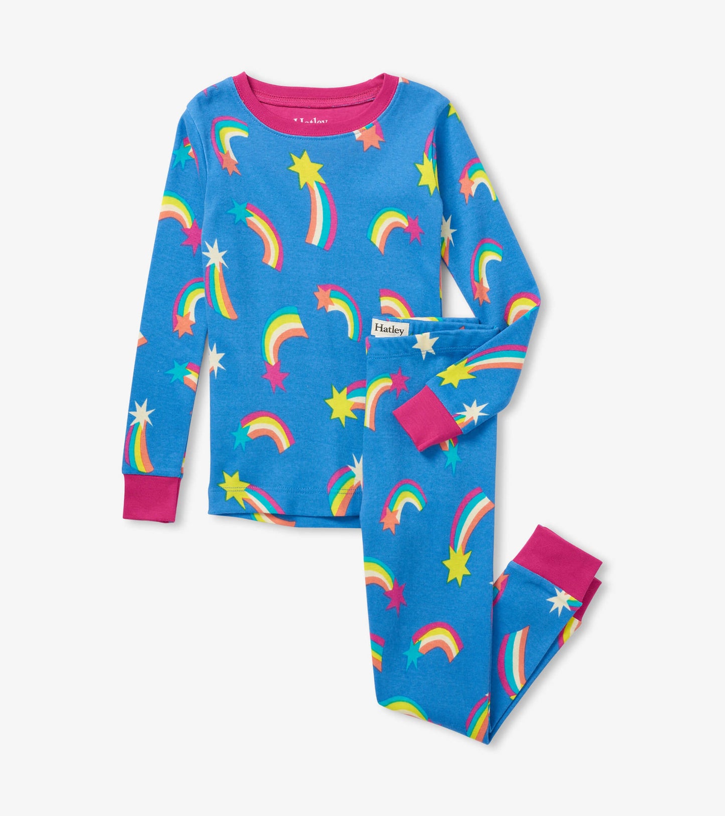 Blue organic cotton pajama set featuring colorful rainbows and stars, with pink cuffs on the long-sleeve top and pants.