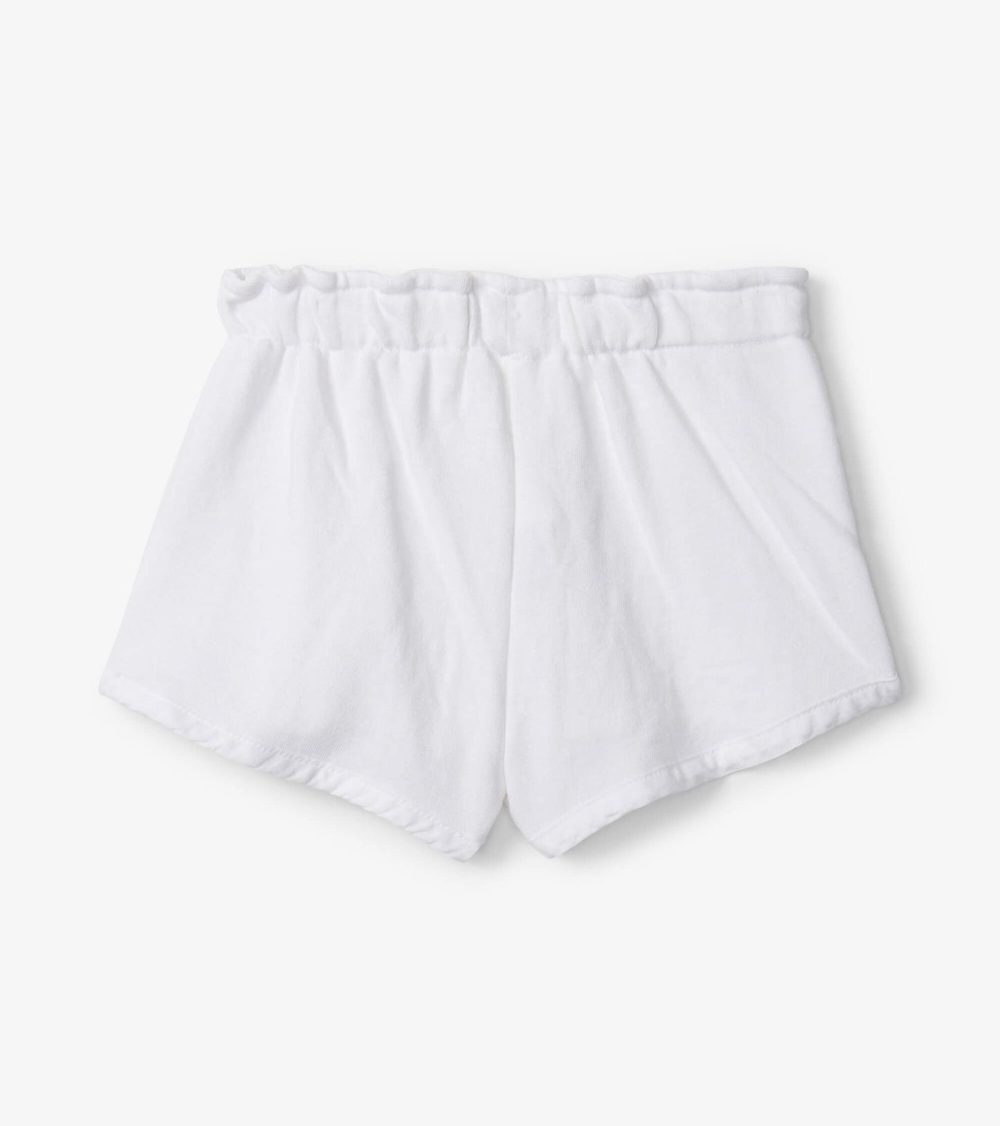 White cotton adventure shorts with an elastic waistband, designed for comfort and play.