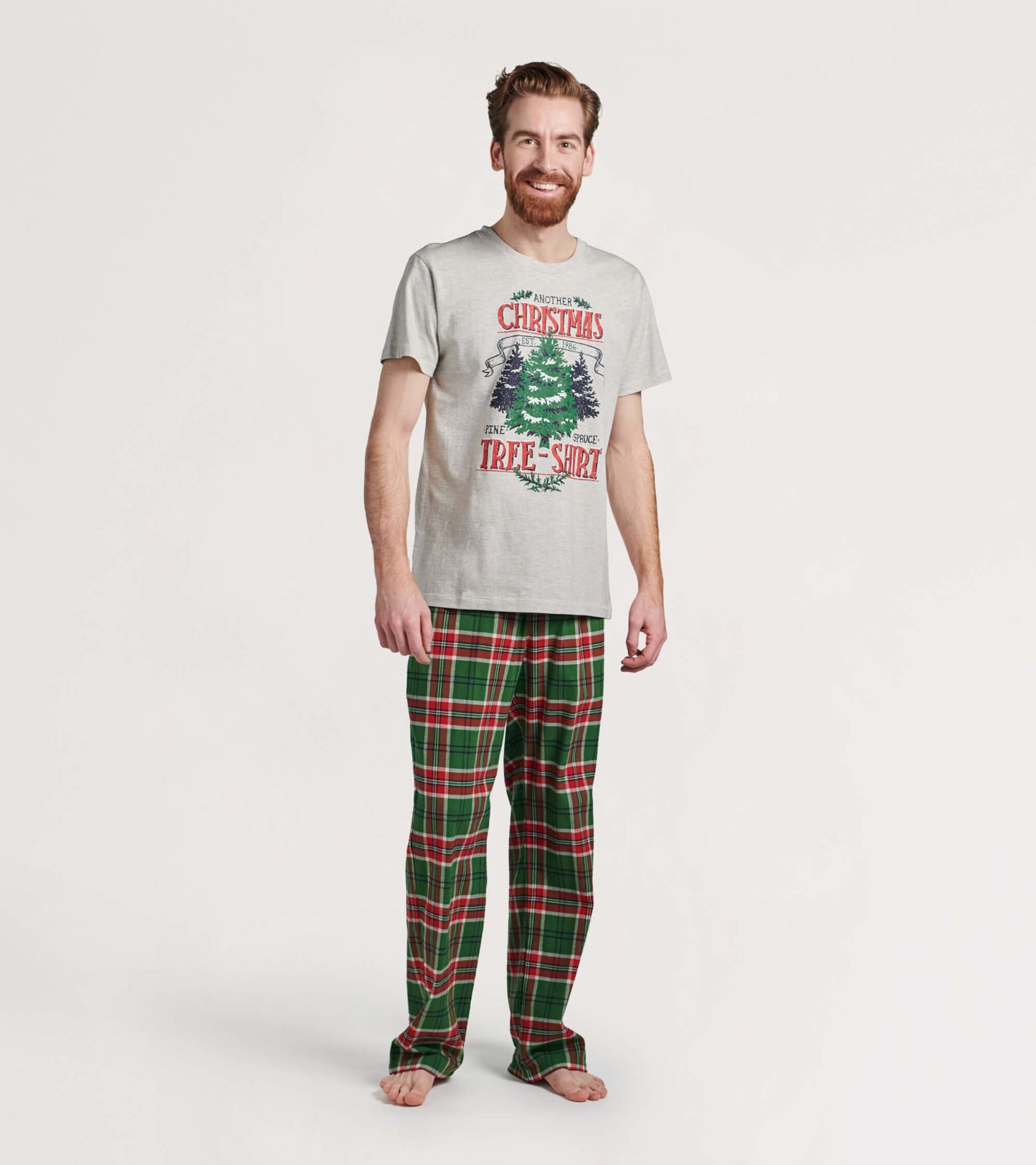 Men's flannel pajama pants in green and red plaid pattern, perfect for cozy holiday lounging.