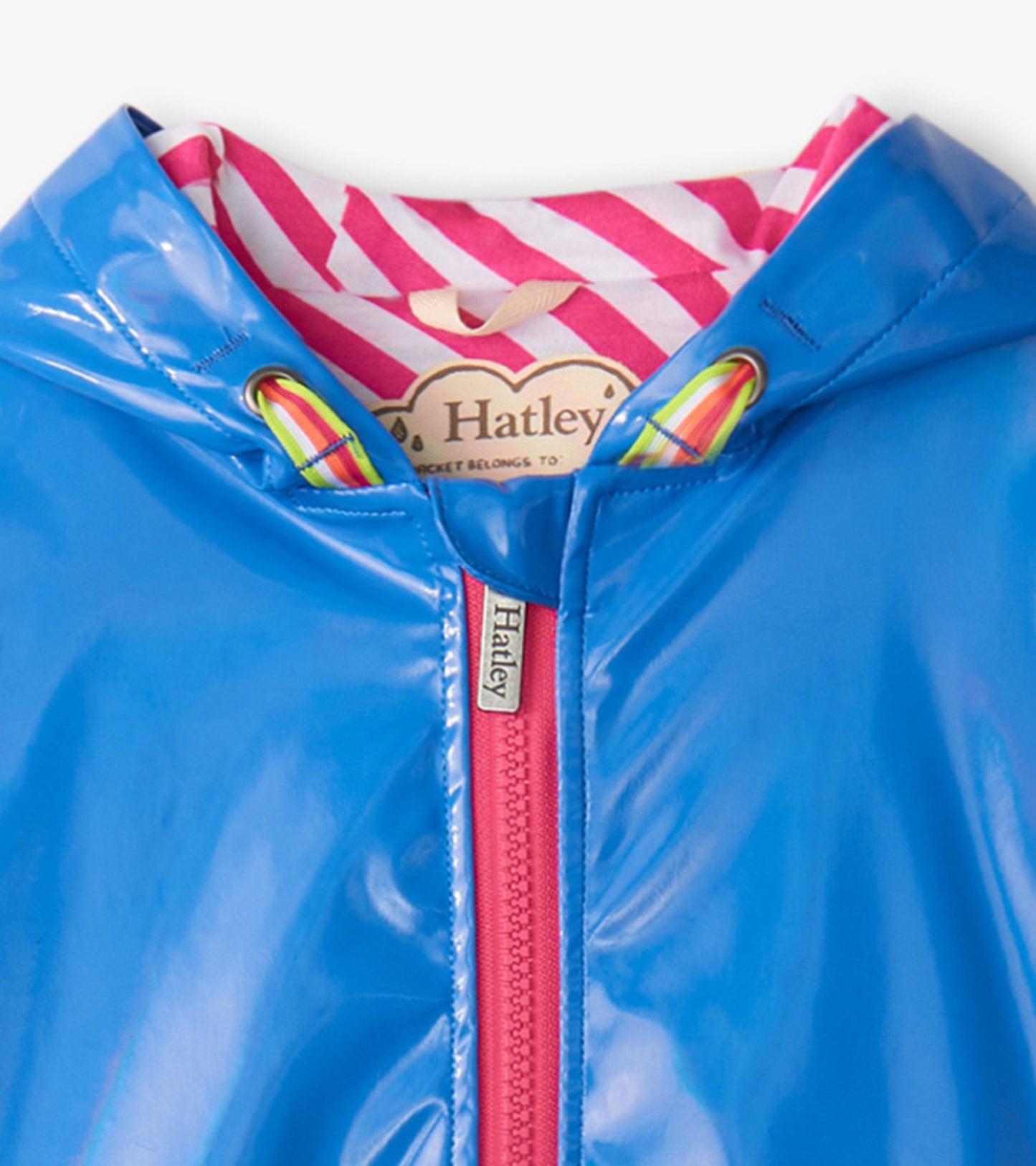 Blue glitter swing jacket with a shiny exterior and striped pink lining, featuring a front zipper and hood.