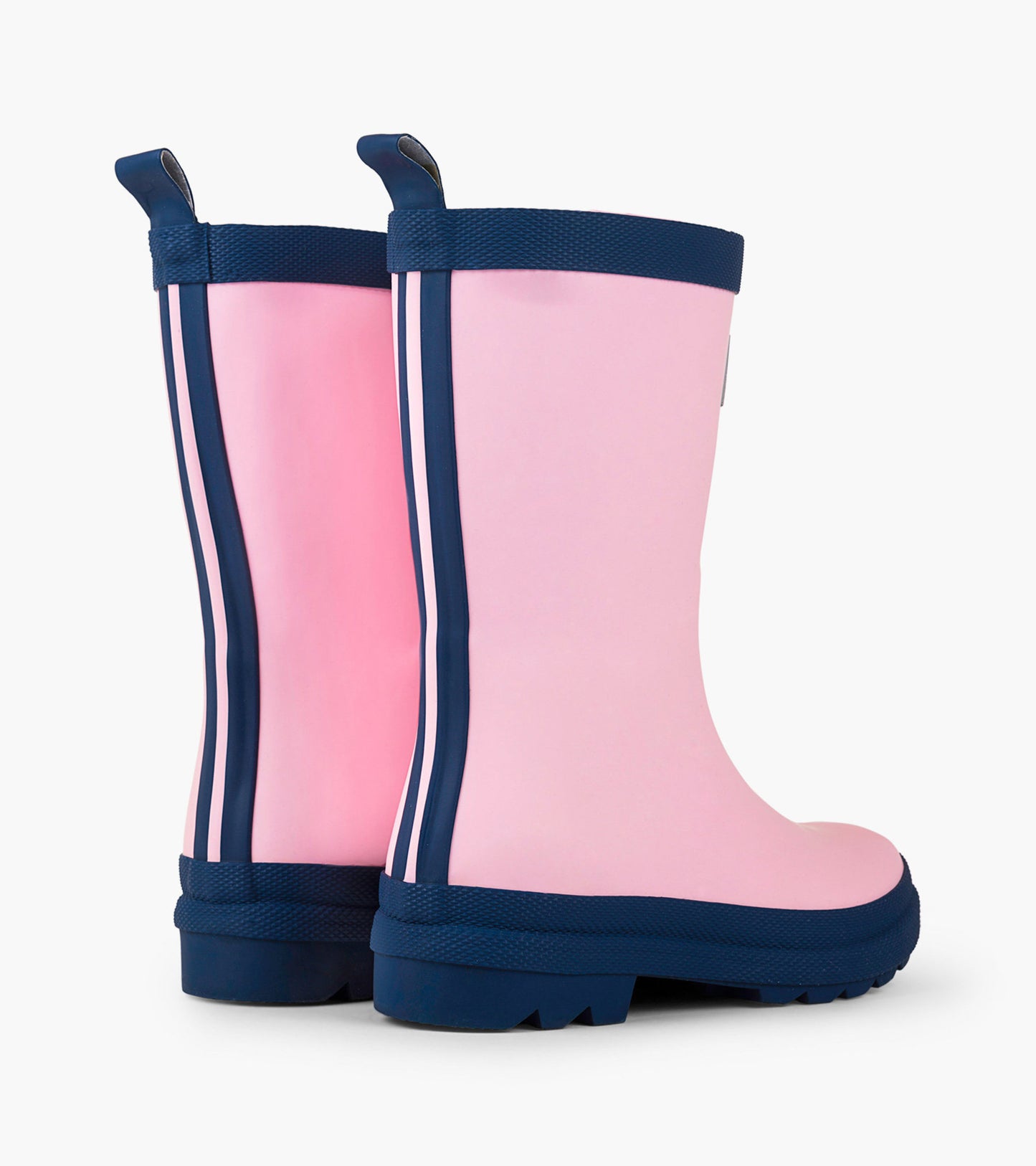 Pink and navy matte rain boots with a textured sole and striped detailing, designed for kids.