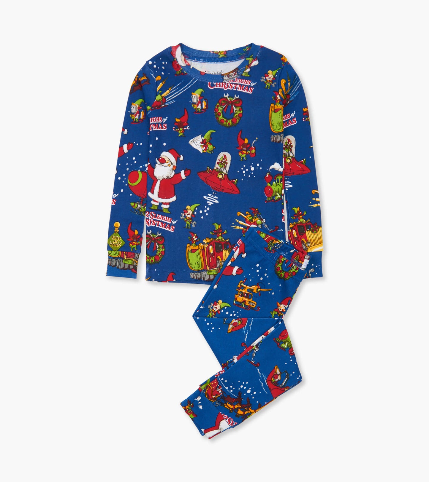 Blue pajama set featuring festive Christmas patterns with Santa, elves, and holiday decorations. Long sleeves and pants.
