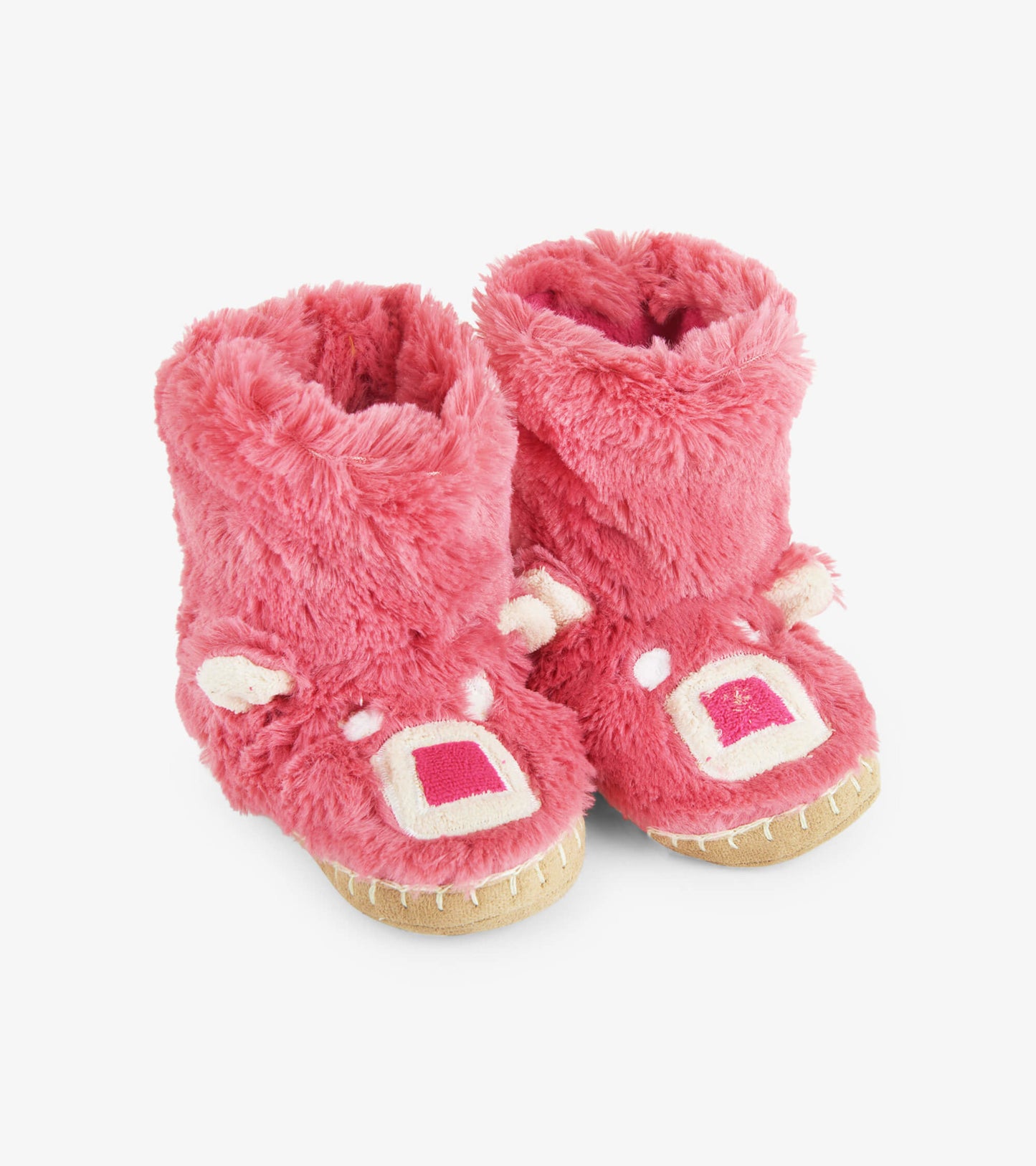 Pink fuzzy slouch slippers shaped like a bear, featuring ears and a stitched sole, ideal for kids' indoor wear.