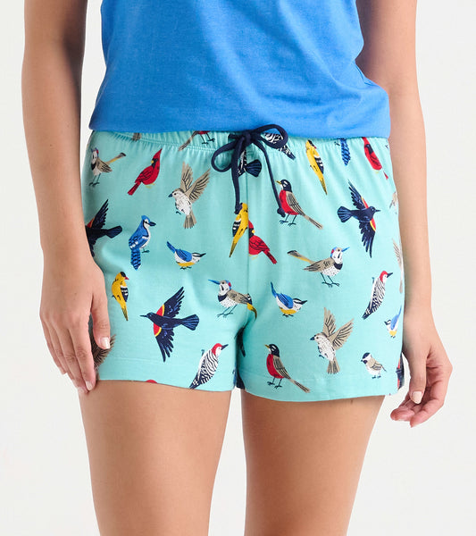 Light blue cotton sleep shorts featuring a colorful bird print, with an elastic waistband and drawstring.