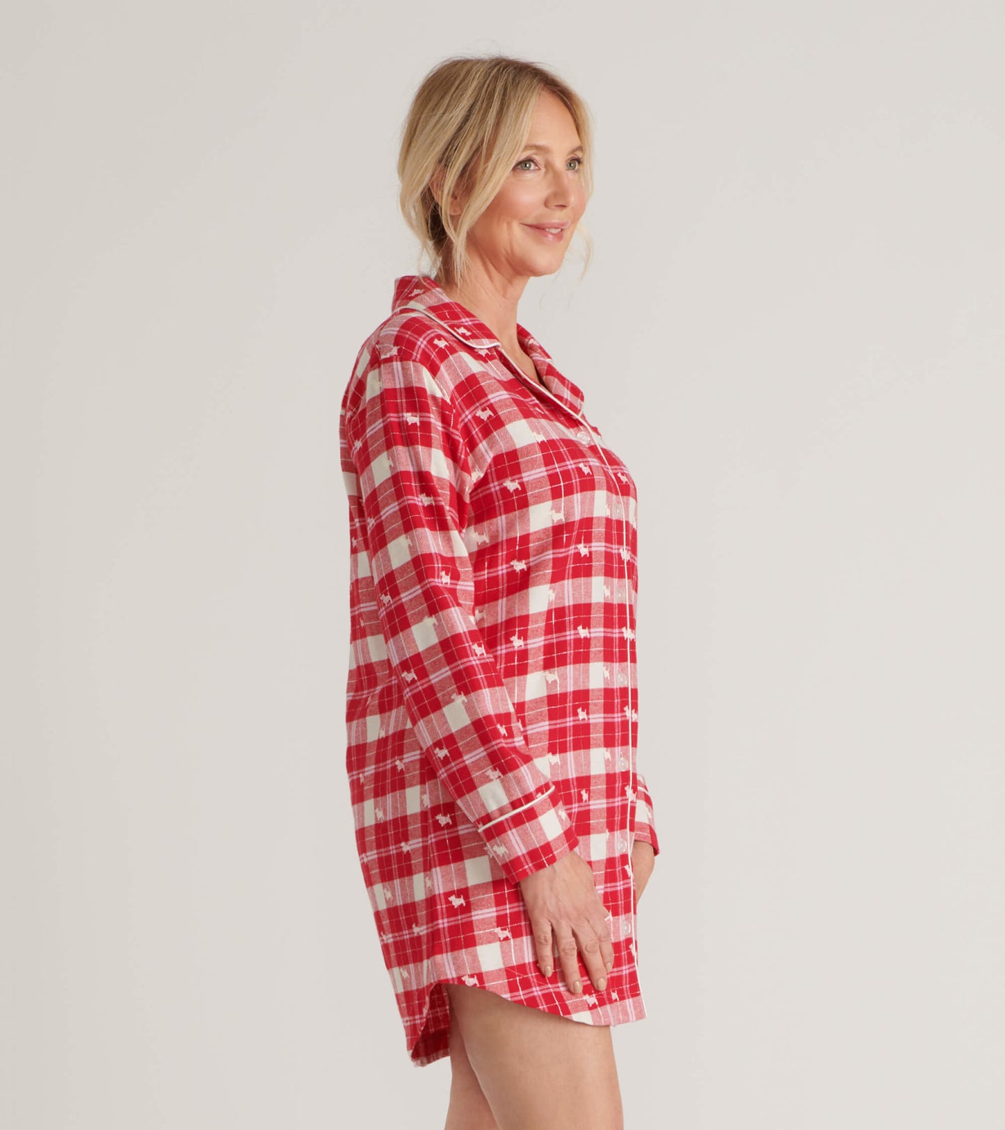 Red and white plaid flannel nightgown with long sleeves and a button-up front, styled for comfort.