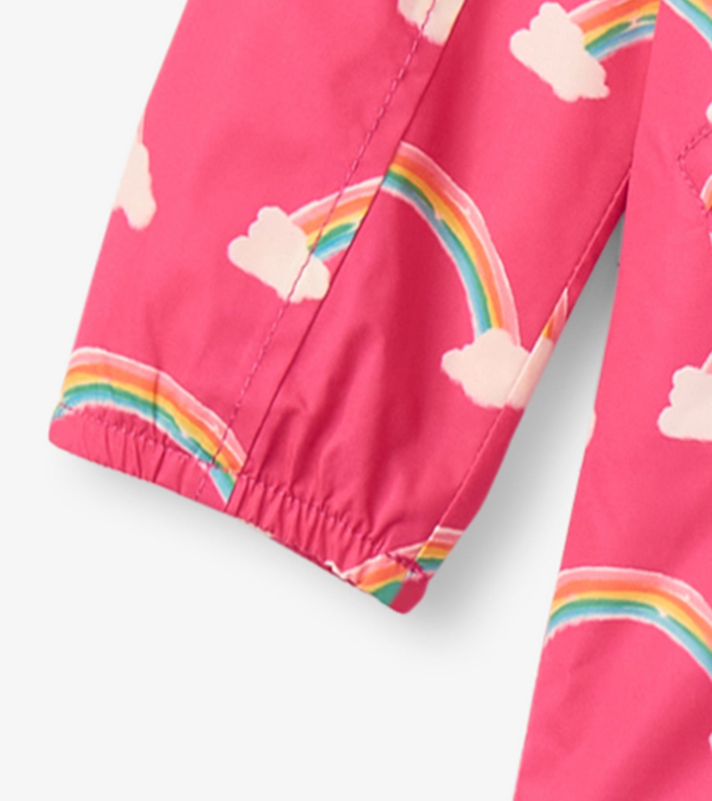 Lightweight pink rain jacket featuring colorful rainbows and clouds, ideal for summer wear.