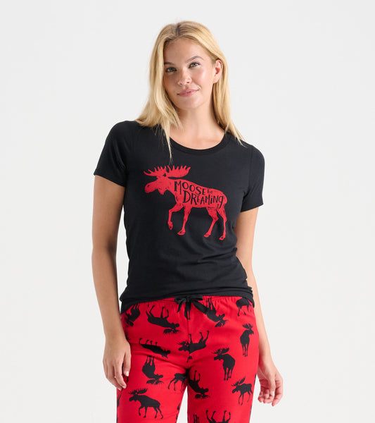 Black pajama t-shirt featuring a red moose graphic, paired with red pants adorned with black moose silhouettes.