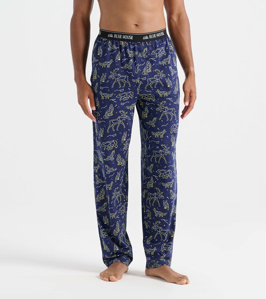 Navy cotton pajama pants featuring animal constellations in yellow, with an elastic waistband for comfort.