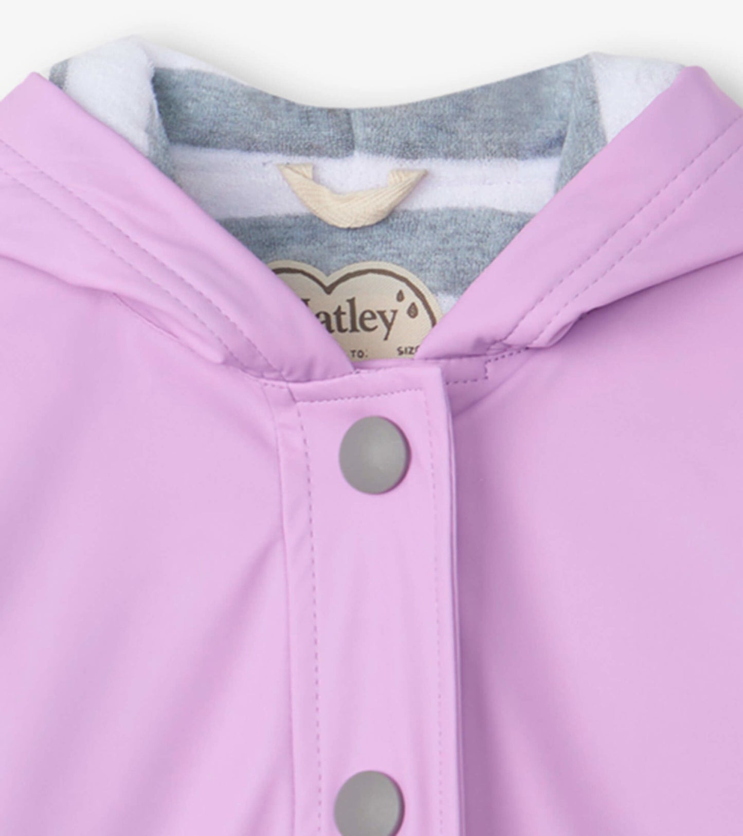 Lilac button-up rain jacket with a hood and gray lining, featuring snap closures at the front.