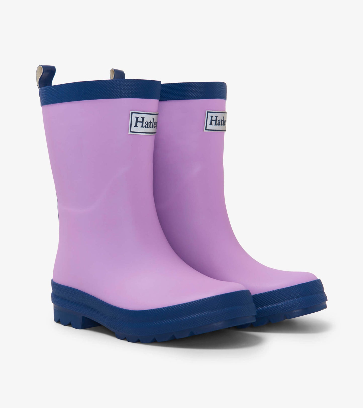 Lilac and navy matte rain boots with a textured sole, designed for kids, featuring pull tabs for easy wear.
