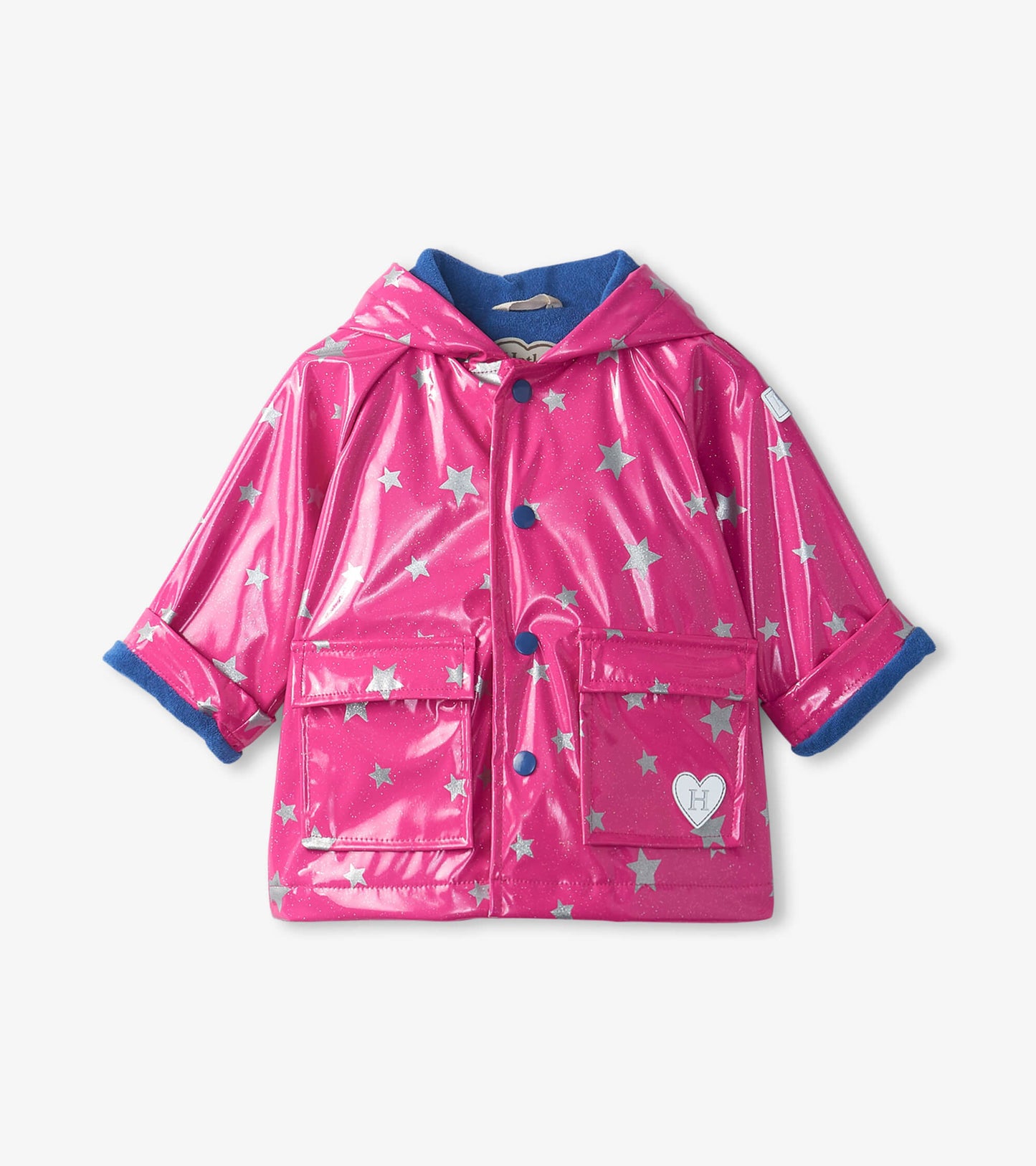 Pink glittery baby raincoat with silver stars, hood, and blue trim, featuring two front pockets.