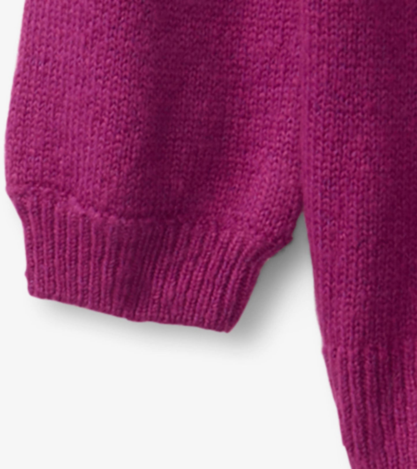 Fuchsia knit sweater with ribbed cuffs, featuring a playful unicorn design, suitable for infants and toddlers.