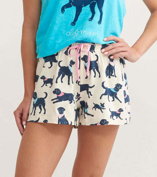 Cotton sleep shorts featuring a playful dog print in navy on a cream background, with a pink drawstring waist.