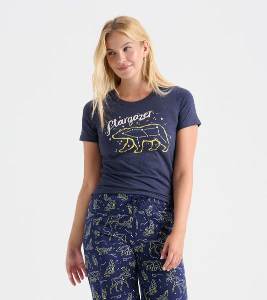 Navy blue pajama t-shirt featuring a bear constellation graphic and "Stargazer" text, paired with patterned pajama pants.