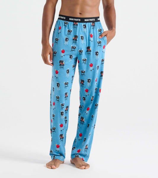 Light blue pajama pants featuring a playful barbecue grill pattern, with an elastic waistband and side pockets.