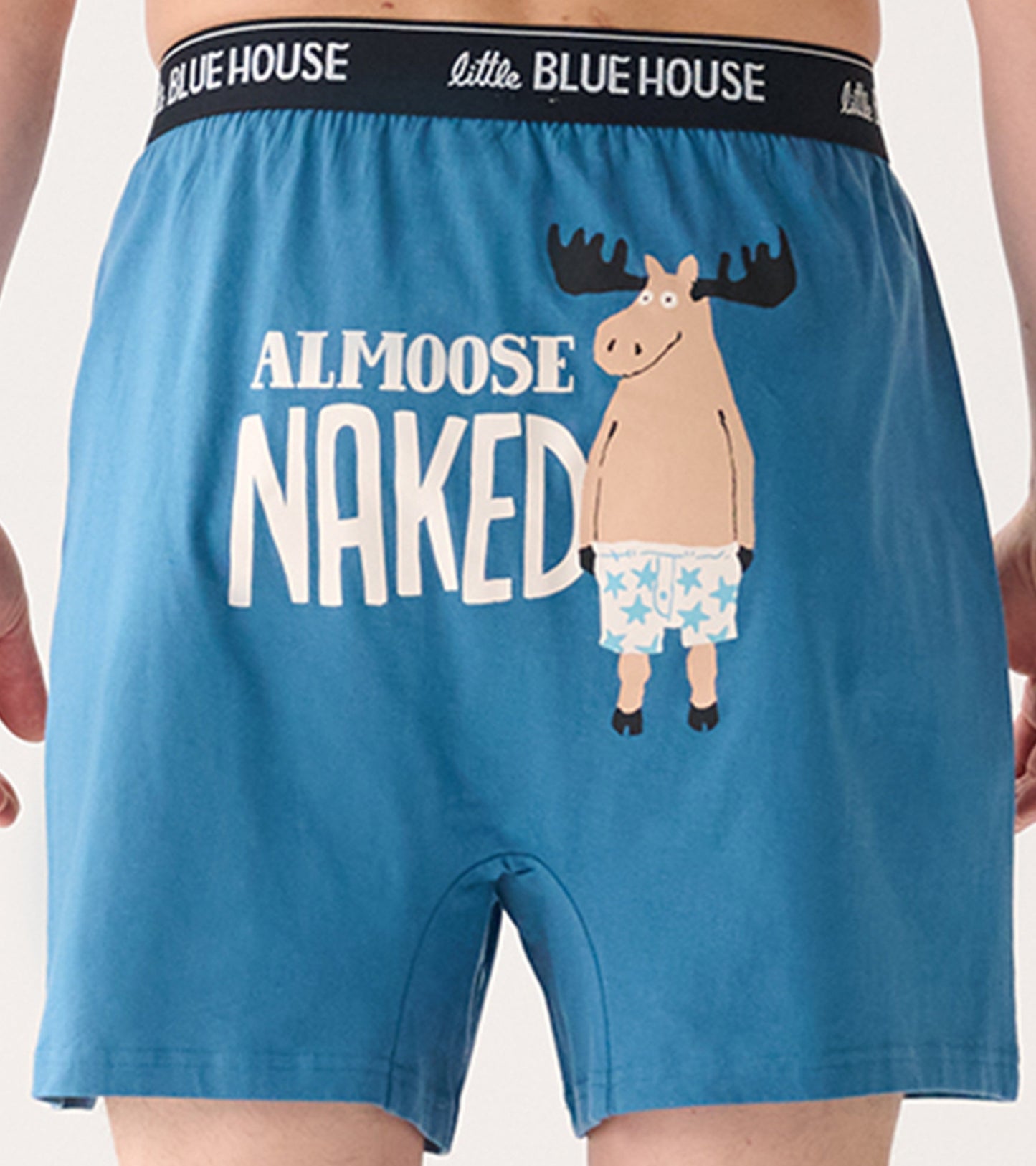Blue cotton boxer shorts featuring a moose graphic and the word "NAKED" on the back.