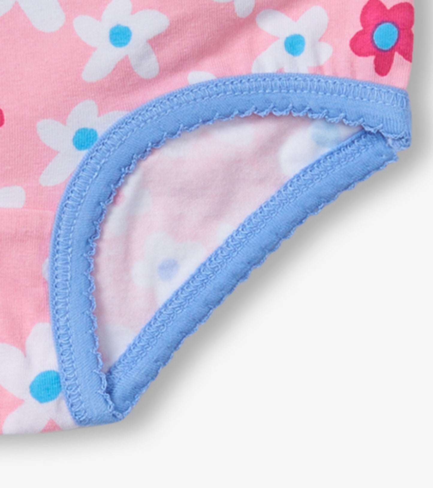 Pink hipster underwear with floral pattern and blue trim, featuring soft cotton material for comfort.