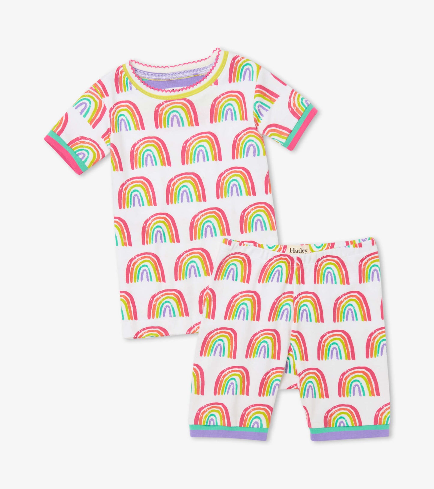 Short pajama set featuring colorful rainbow patterns on soft organic cotton fabric. Includes a short-sleeve top and shorts.