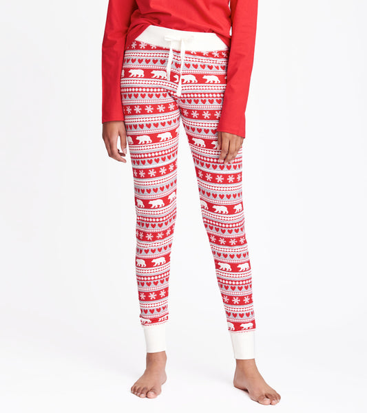 Red sleep leggings featuring a Fair Isle pattern with bears, hearts, and snowflakes, finished with a white waistband.