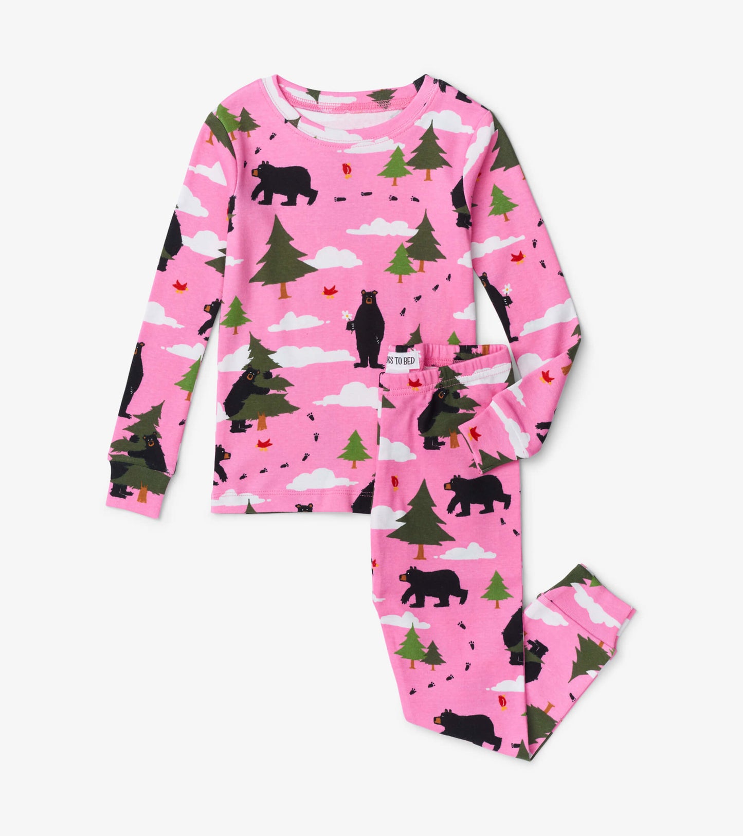 Pink pajama set featuring black bears and trees, with a long-sleeve top and matching pants.