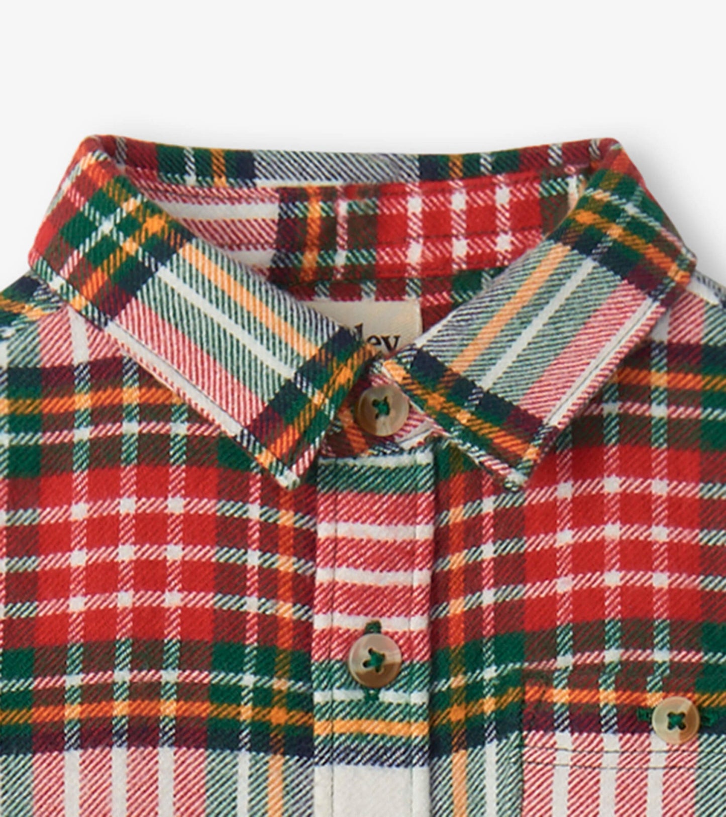 Red, green, and yellow plaid button-down shirt for babies with a collar and wooden buttons.