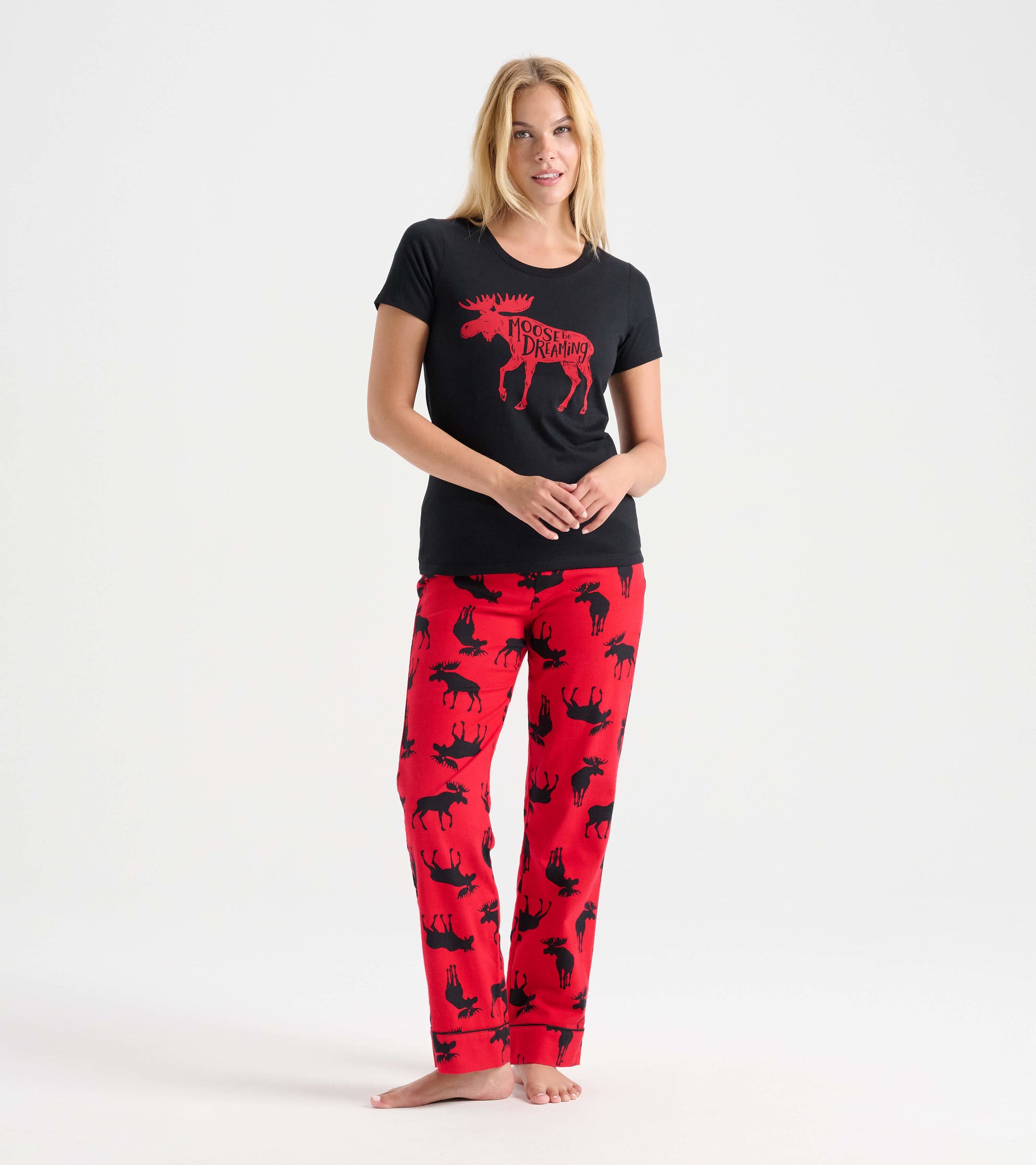 Black pajama t-shirt with red moose graphic, paired with red pants featuring black moose silhouettes.