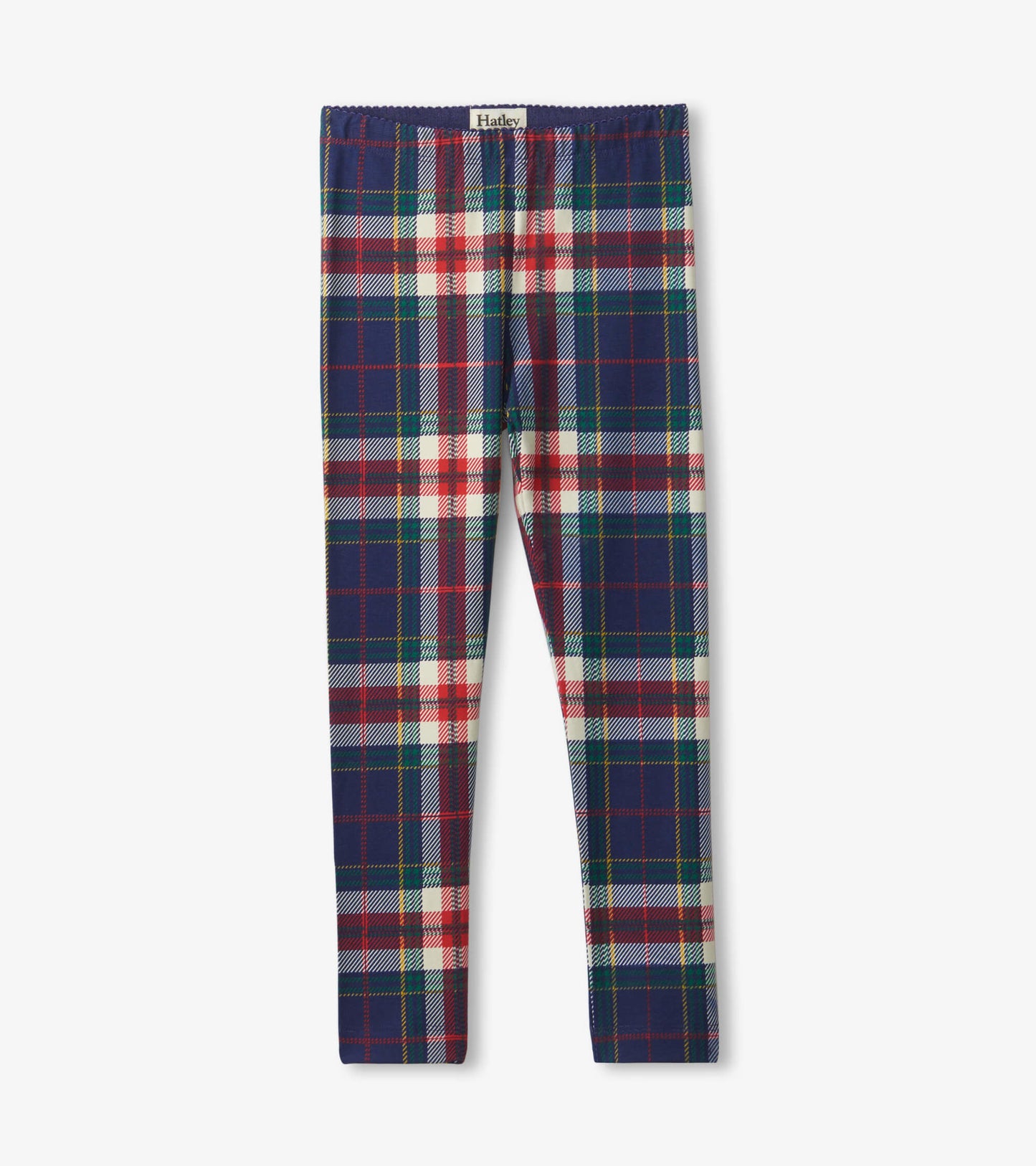 Navy plaid leggings featuring red, green, and white patterns, designed for girls, with an elastic waistband.