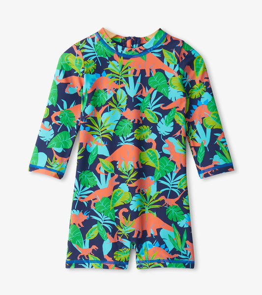 Navy one-piece rashguard featuring colorful dinosaur and jungle leaf patterns, ideal for baby boys.