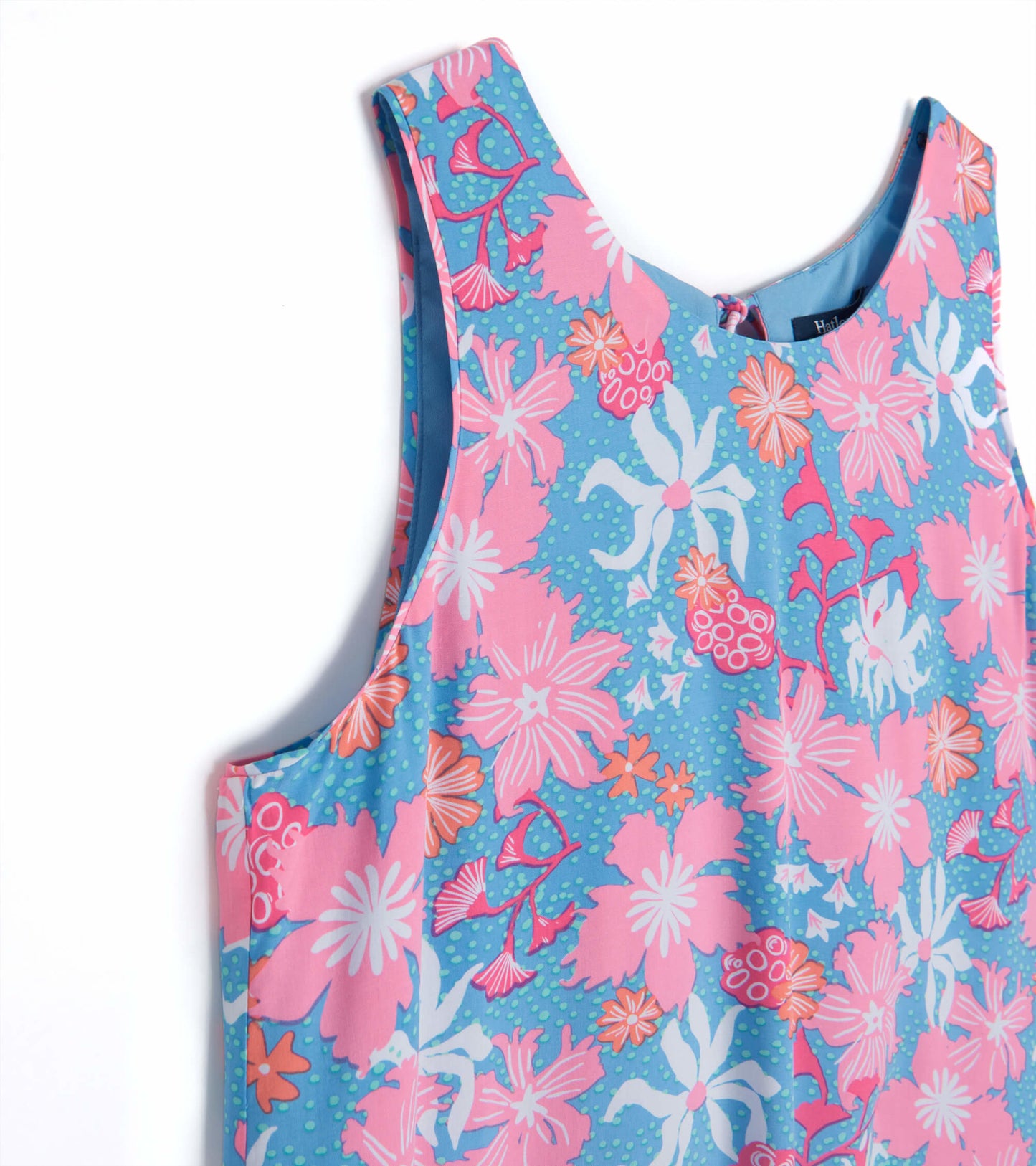 Sleeveless dress featuring a vibrant floral pattern in pink and blue, ideal for casual summer wear.