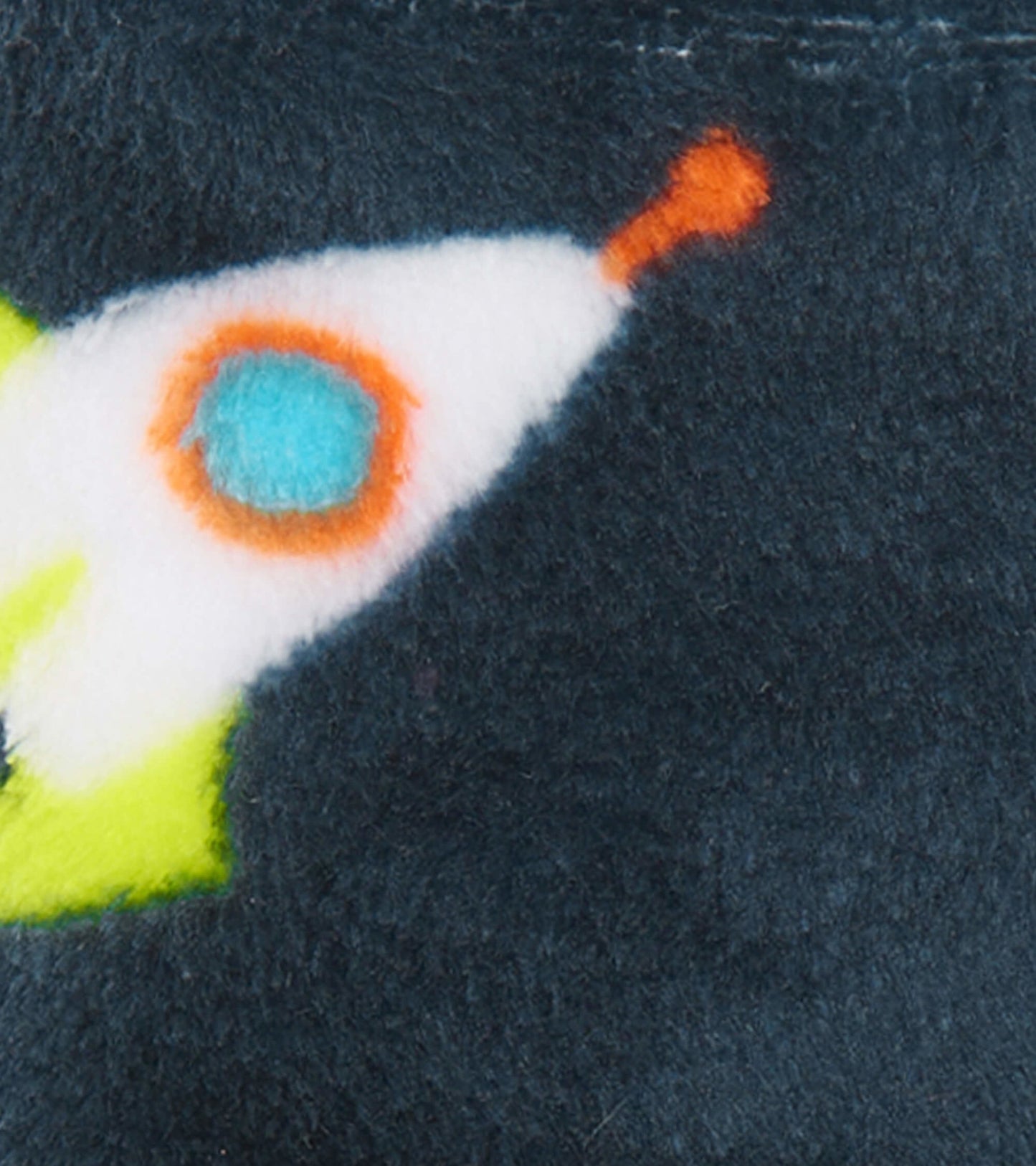 Navy fleece slippers featuring a colorful rocket design, perfect for kids' indoor wear.