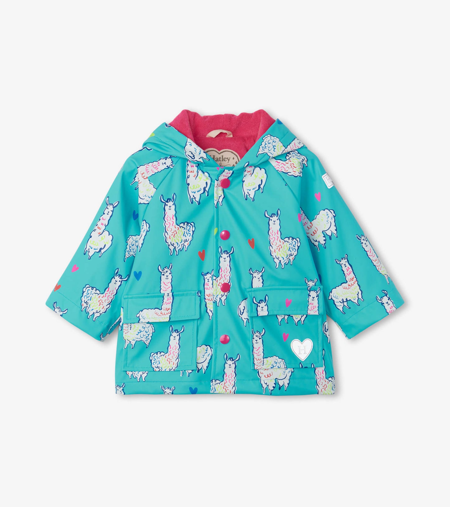 Turquoise baby raincoat featuring colorful alpaca prints, a pink hood lining, and front pockets.