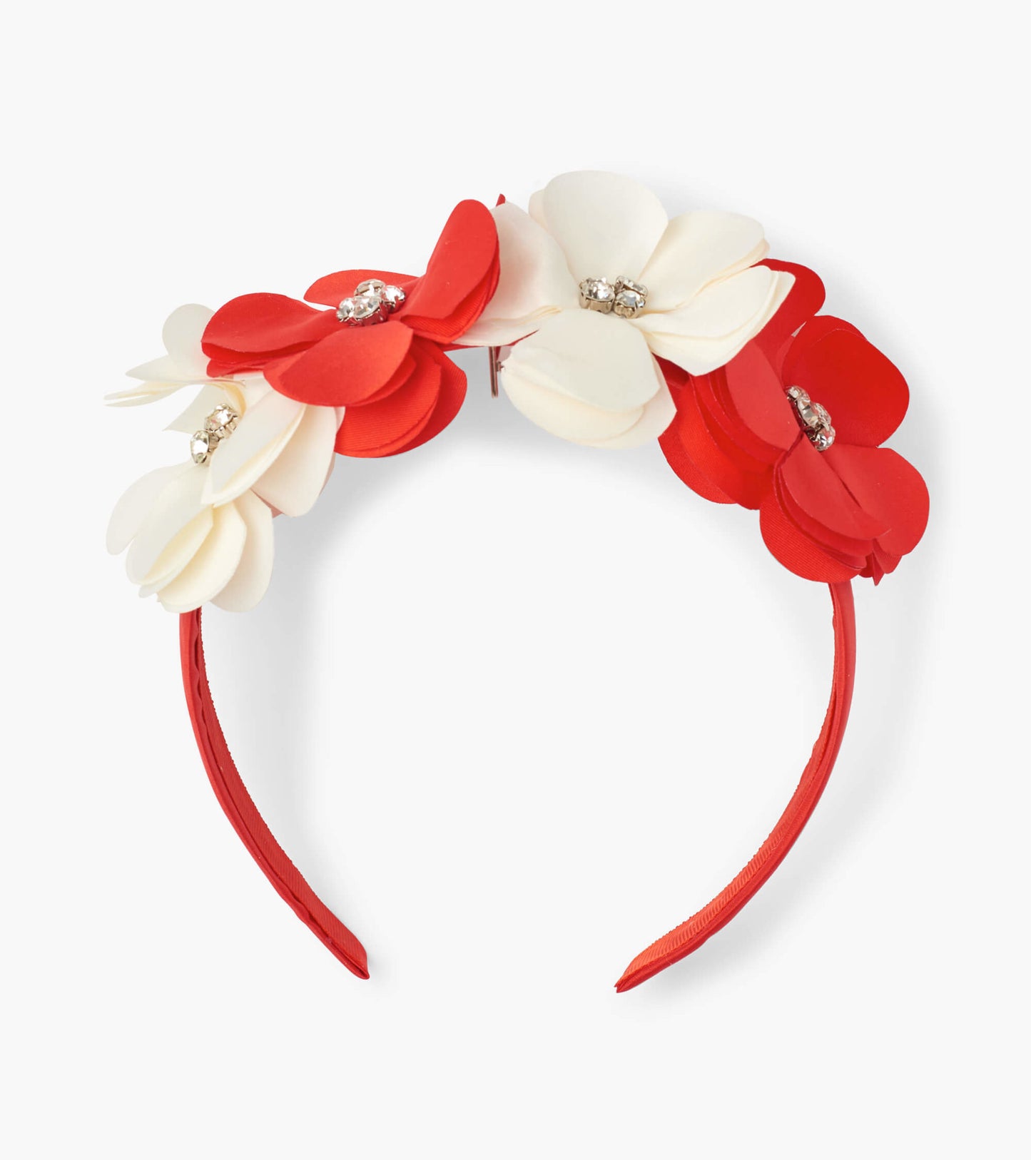 Red and white flower headband with embellishments, designed for kids, featuring a flexible band for comfortable wear.