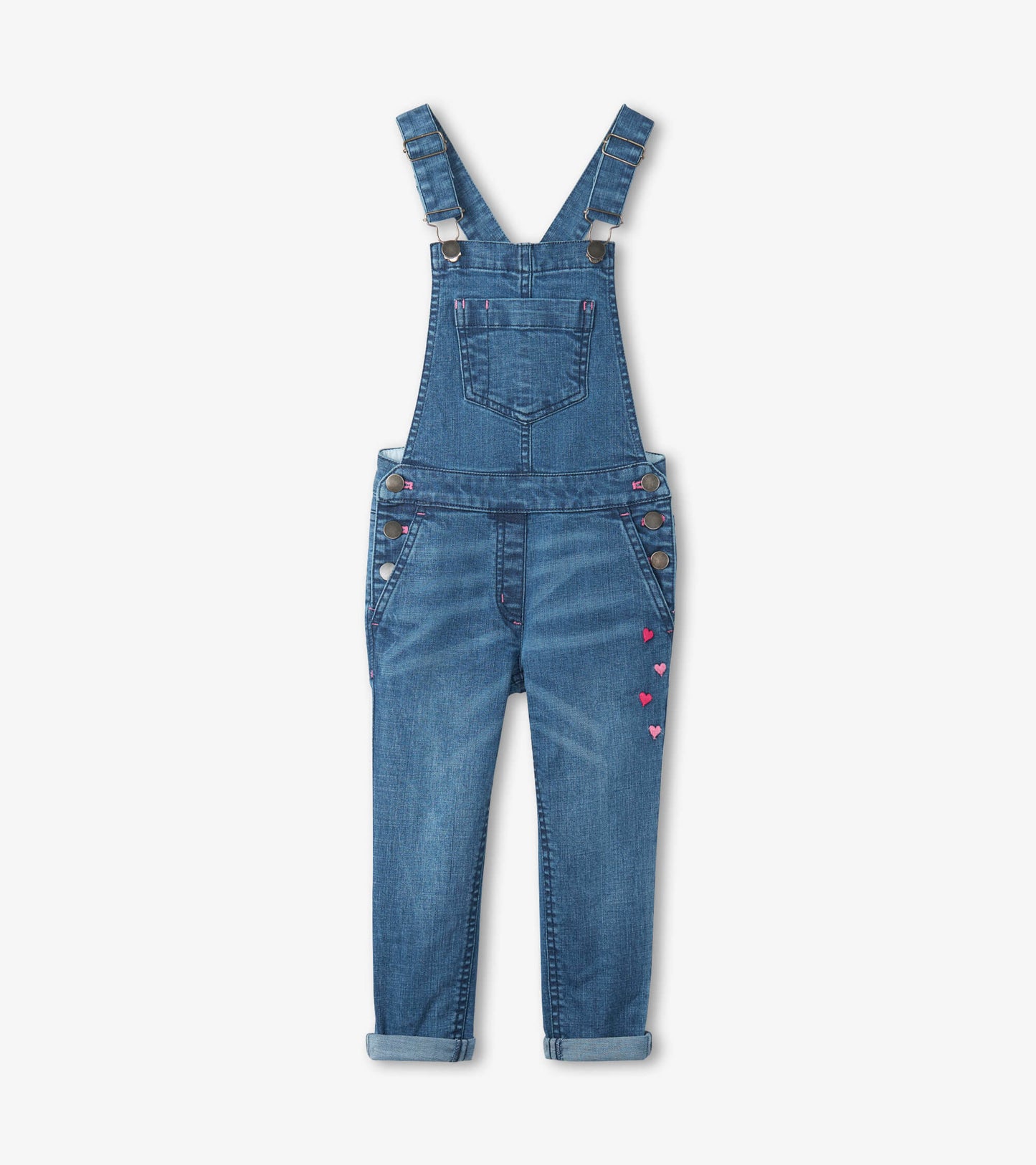 Blue denim overalls with adjustable straps, front pockets, and heart-shaped embellishments on the side.