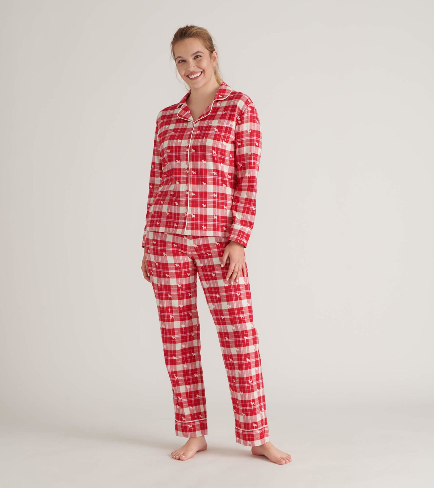 Red plaid flannel pajama set featuring long sleeves and pants, designed for comfort and relaxation.