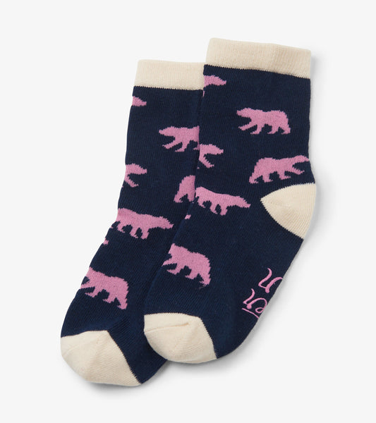 Navy crew socks featuring pink bear silhouettes and a cream cuff, suitable for kids ages 2-7.
