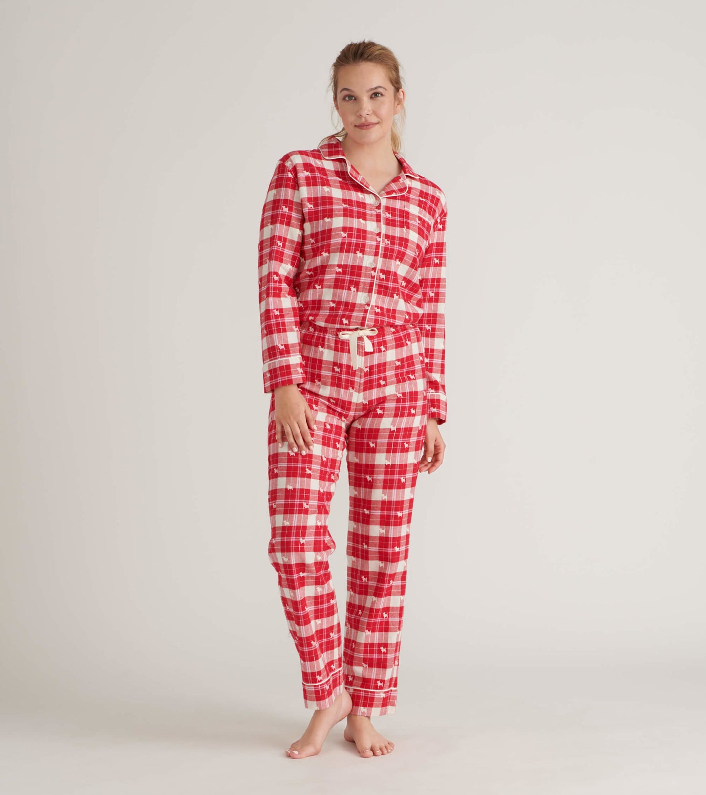 Red plaid flannel pajama set with long sleeves and drawstring pants, perfect for cozy lounging.