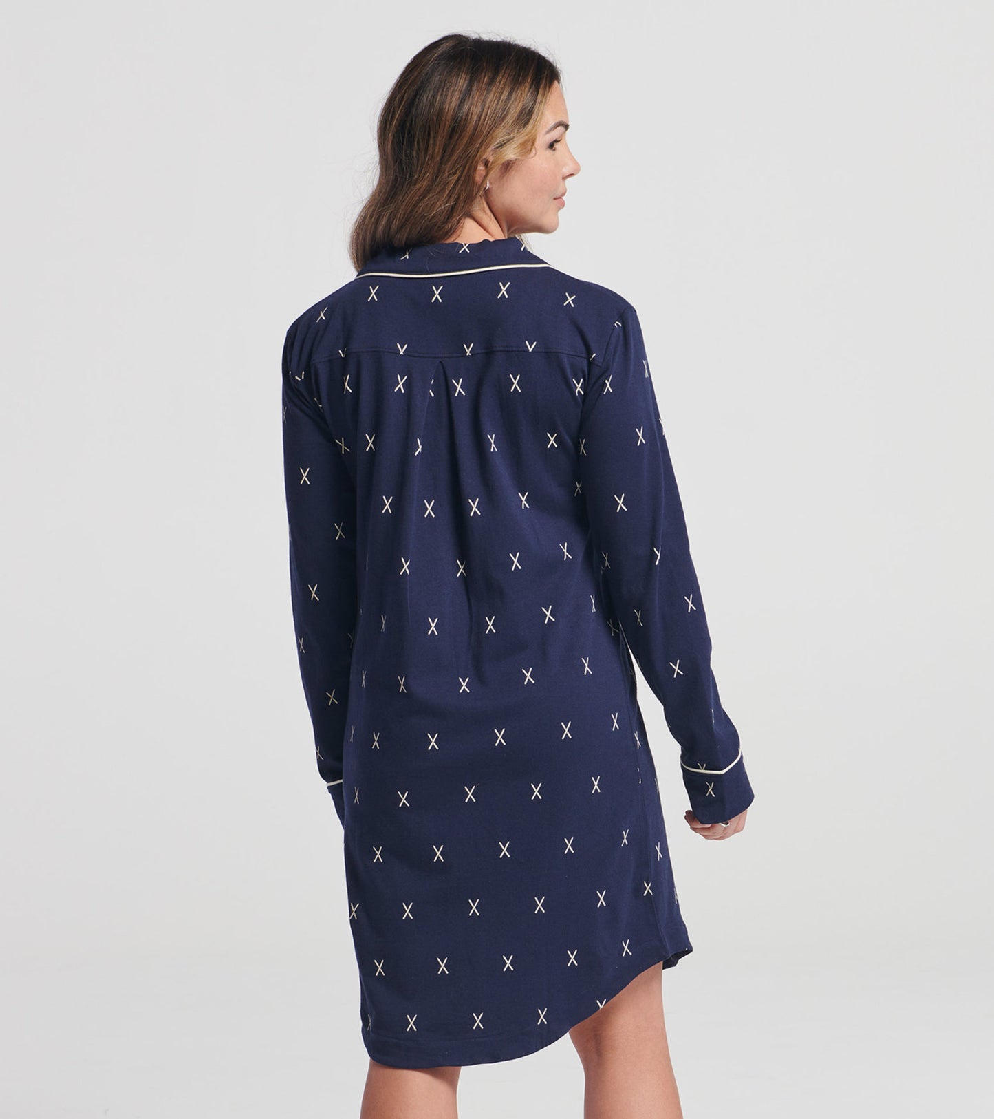 Navy jersey nightgown with white X pattern, long sleeves, and a relaxed fit, shown from the back.