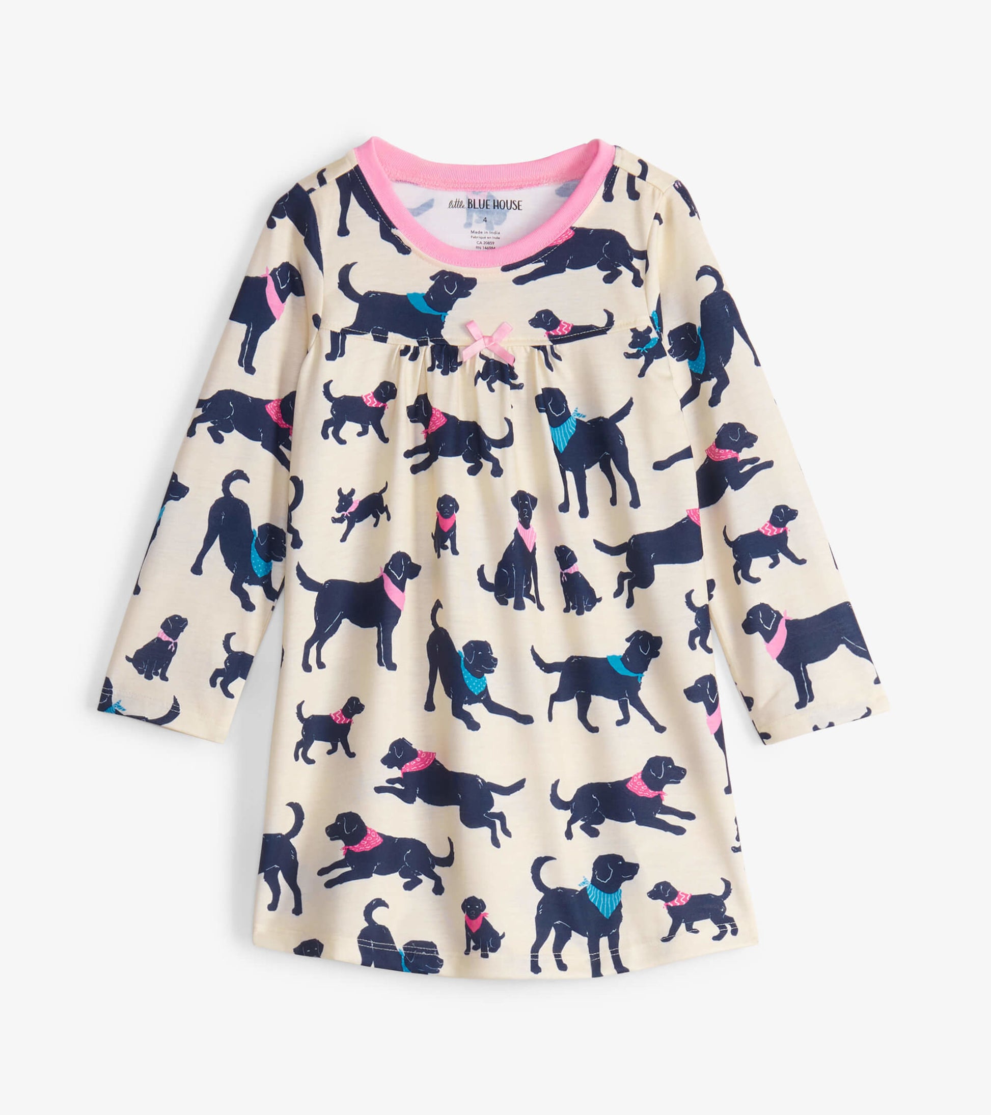 Cream nightdress featuring playful dog patterns in navy, pink, and teal, with a round neckline and long sleeves.