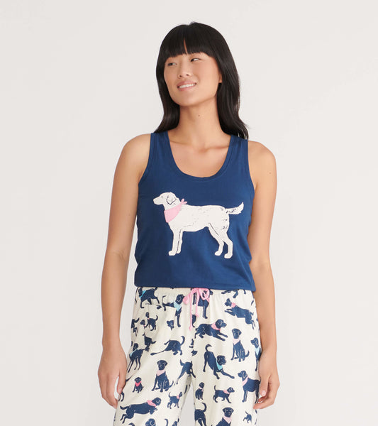 Navy tank top featuring a white dog graphic with a pink bandana, paired with pajama pants covered in dog prints.