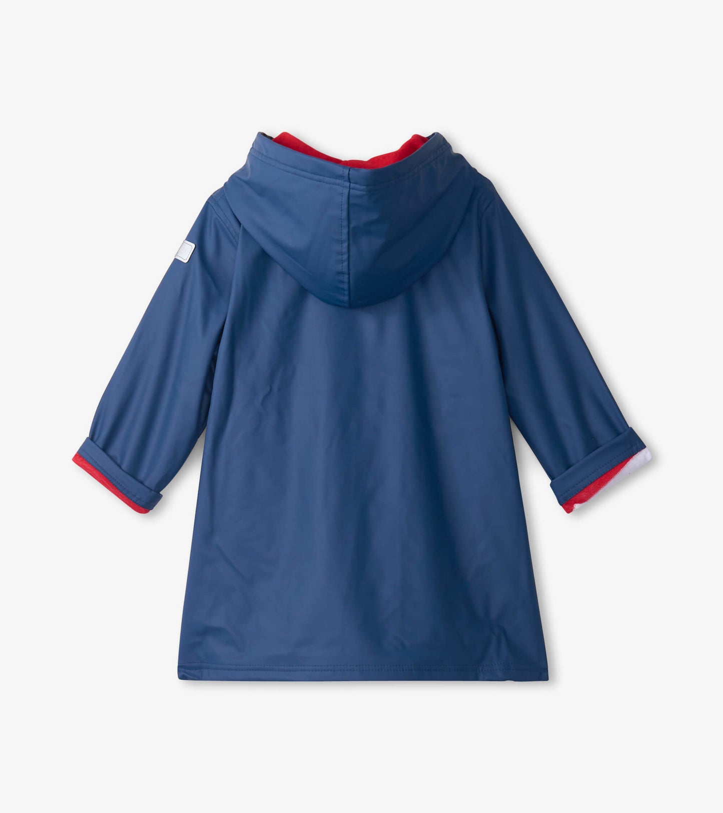 Navy rain jacket with a red hood lining and rolled sleeves, designed for kids. Back view displayed.