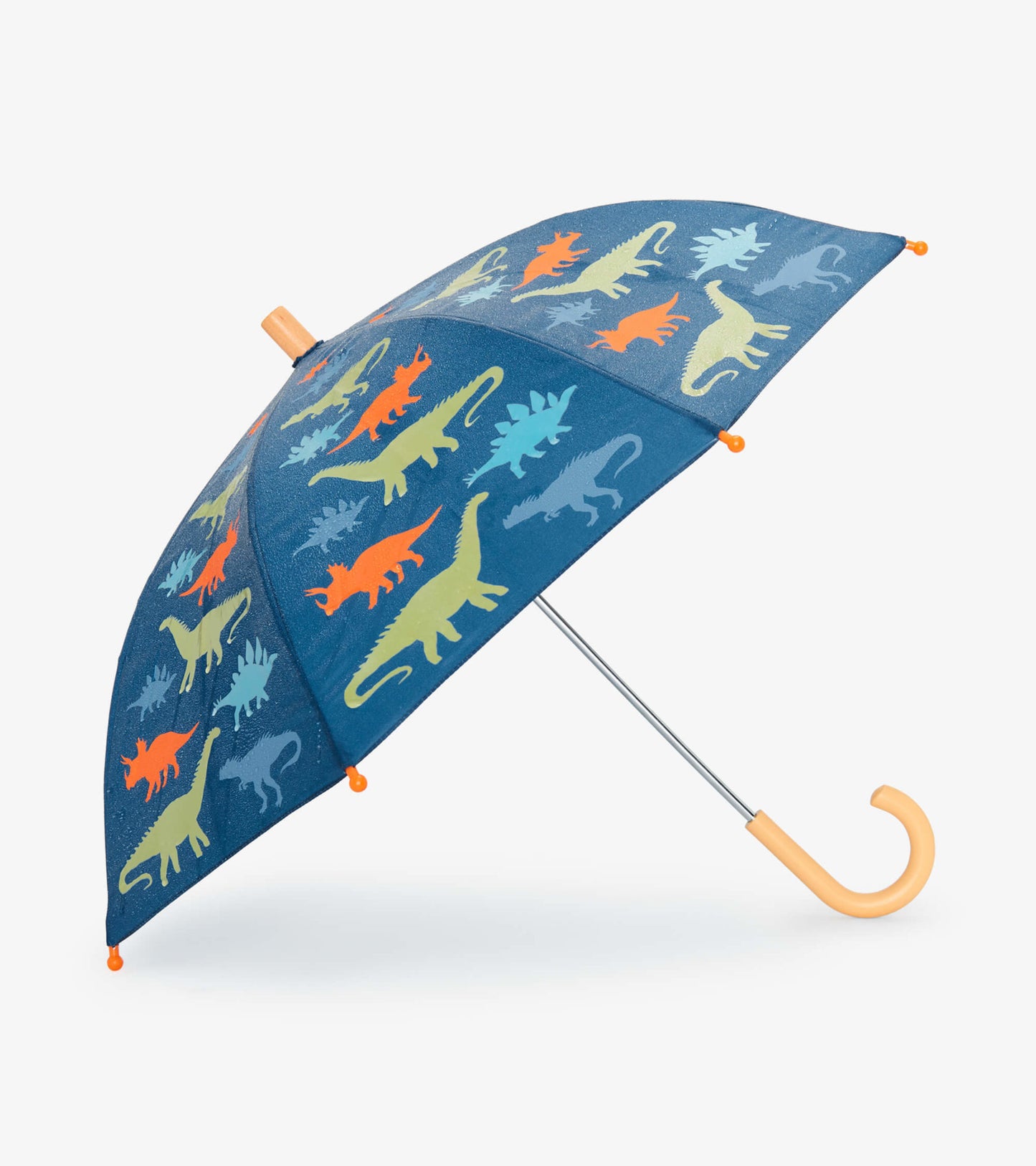 Navy umbrella featuring colorful dinosaur silhouettes, with a curved orange handle and a metallic silver frame.