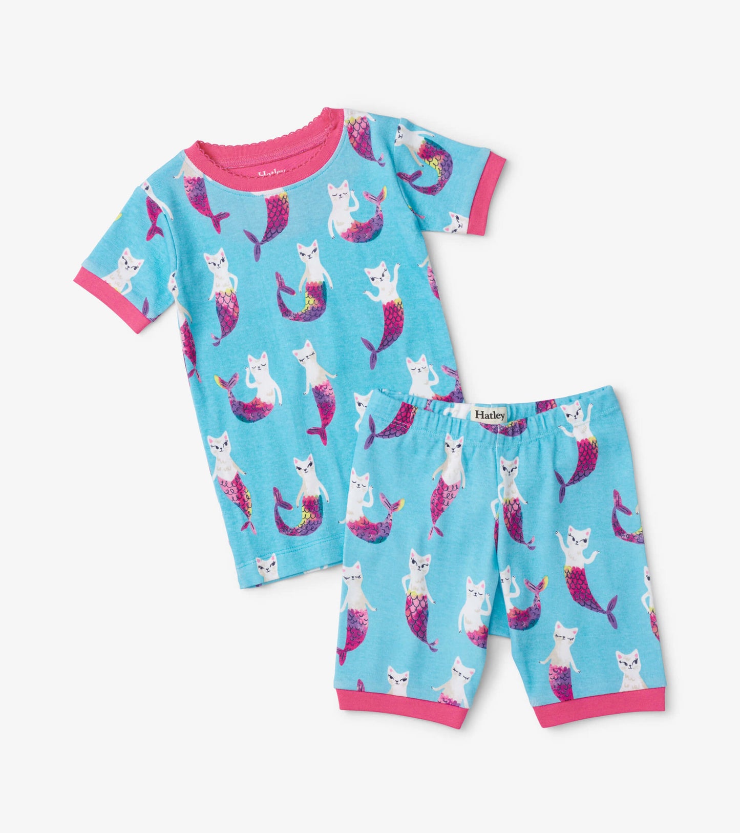 Short pajama set featuring a blue background with mermaid cats, pink trim, and elastic waistband shorts.