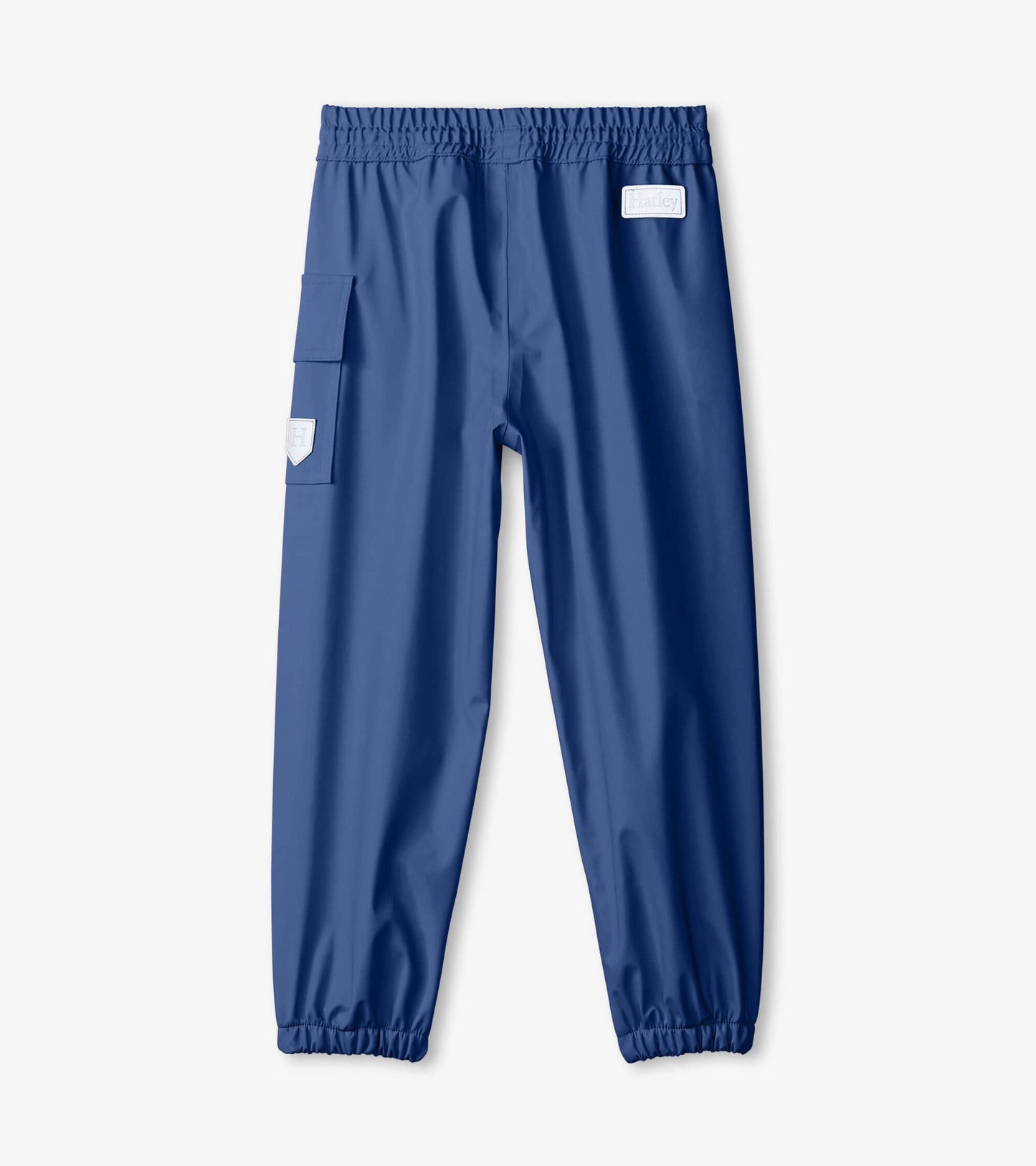 Navy blue kids' rain pants with an elastic waistband and side pocket, made from waterproof material.