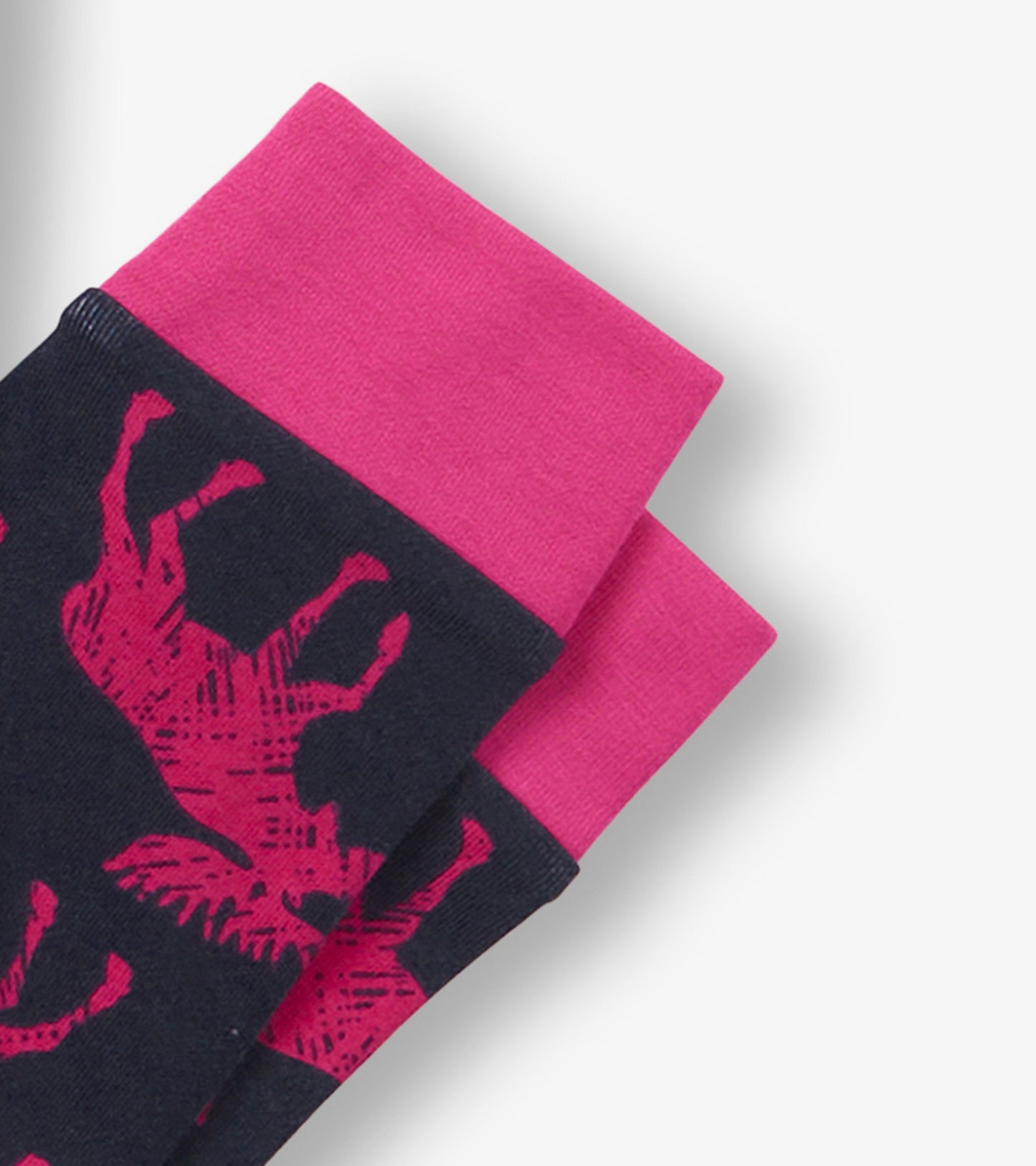 Navy pajama top with pink cuffs featuring a moose pattern, suitable for kids.