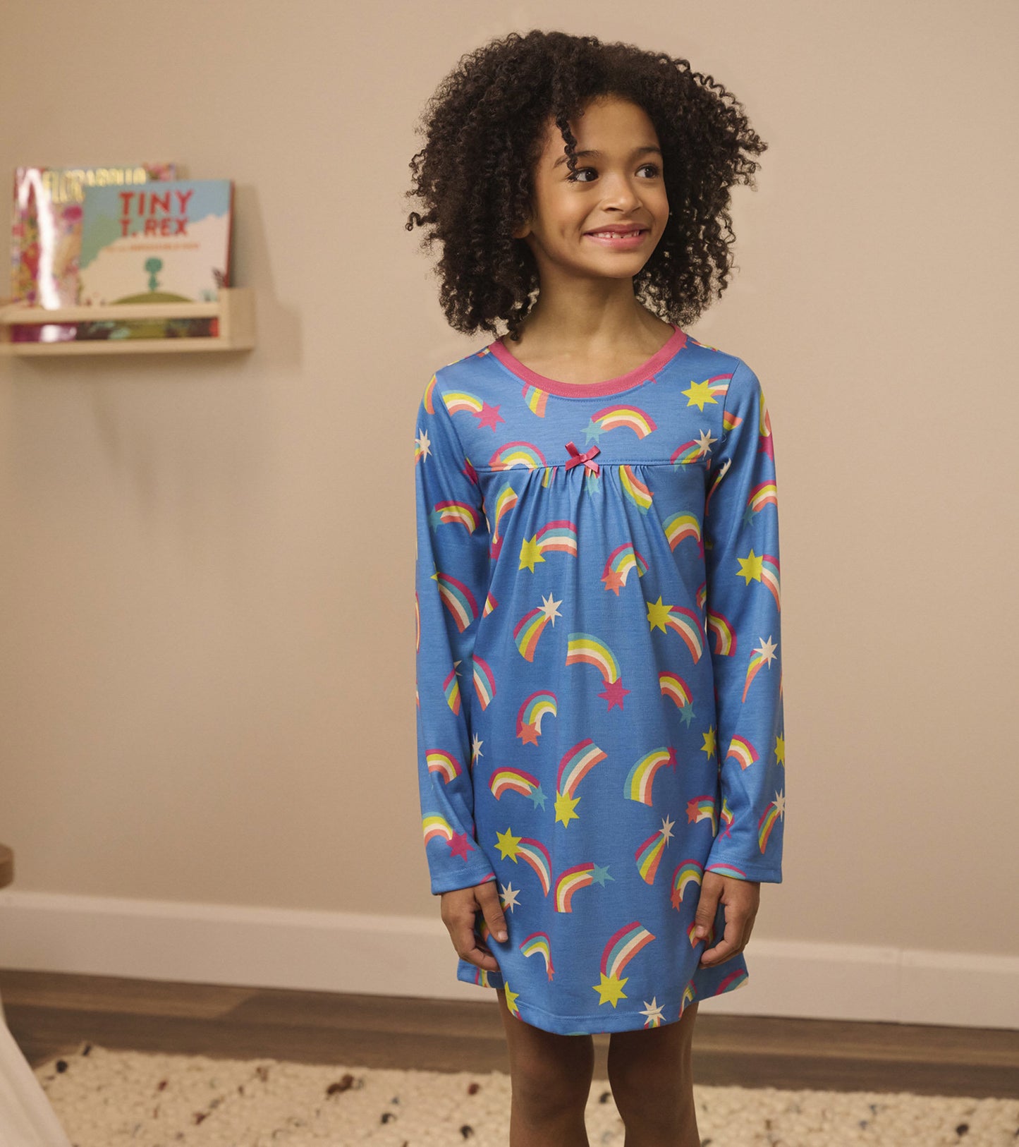 Blue long sleeve nightgown featuring colorful rainbows and stars, designed for girls.