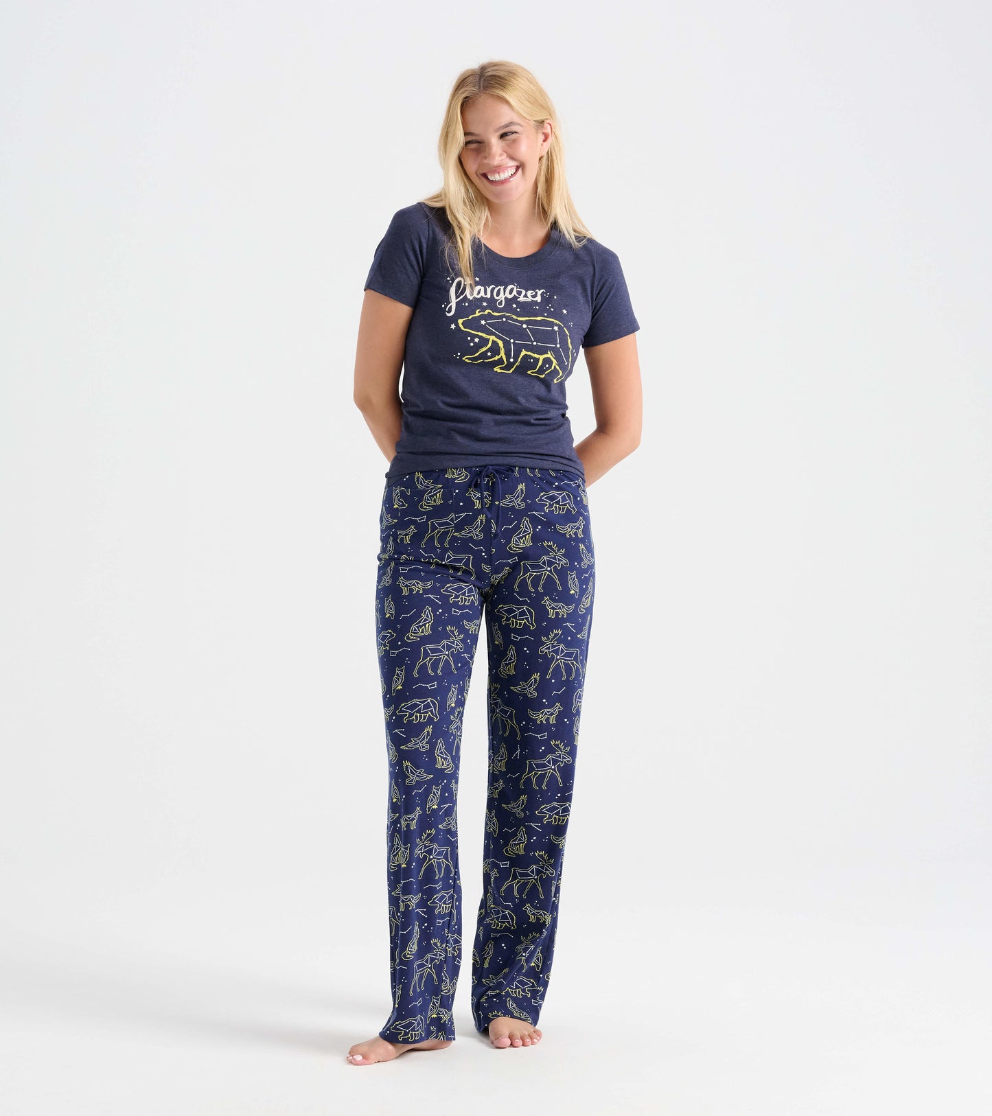 Navy cotton pajama pants featuring animal constellations in a light pattern, designed for comfort and relaxation.