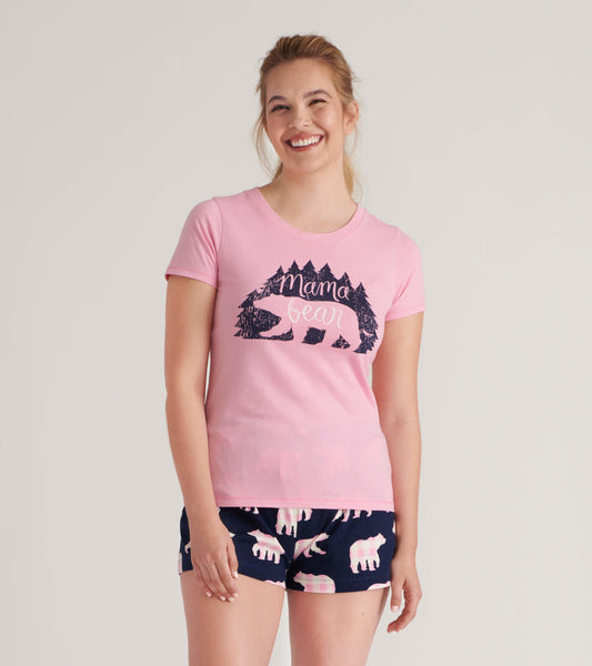 Pink short-sleeve pajama t-shirt featuring a bear graphic and text, paired with navy shorts with bear patterns.