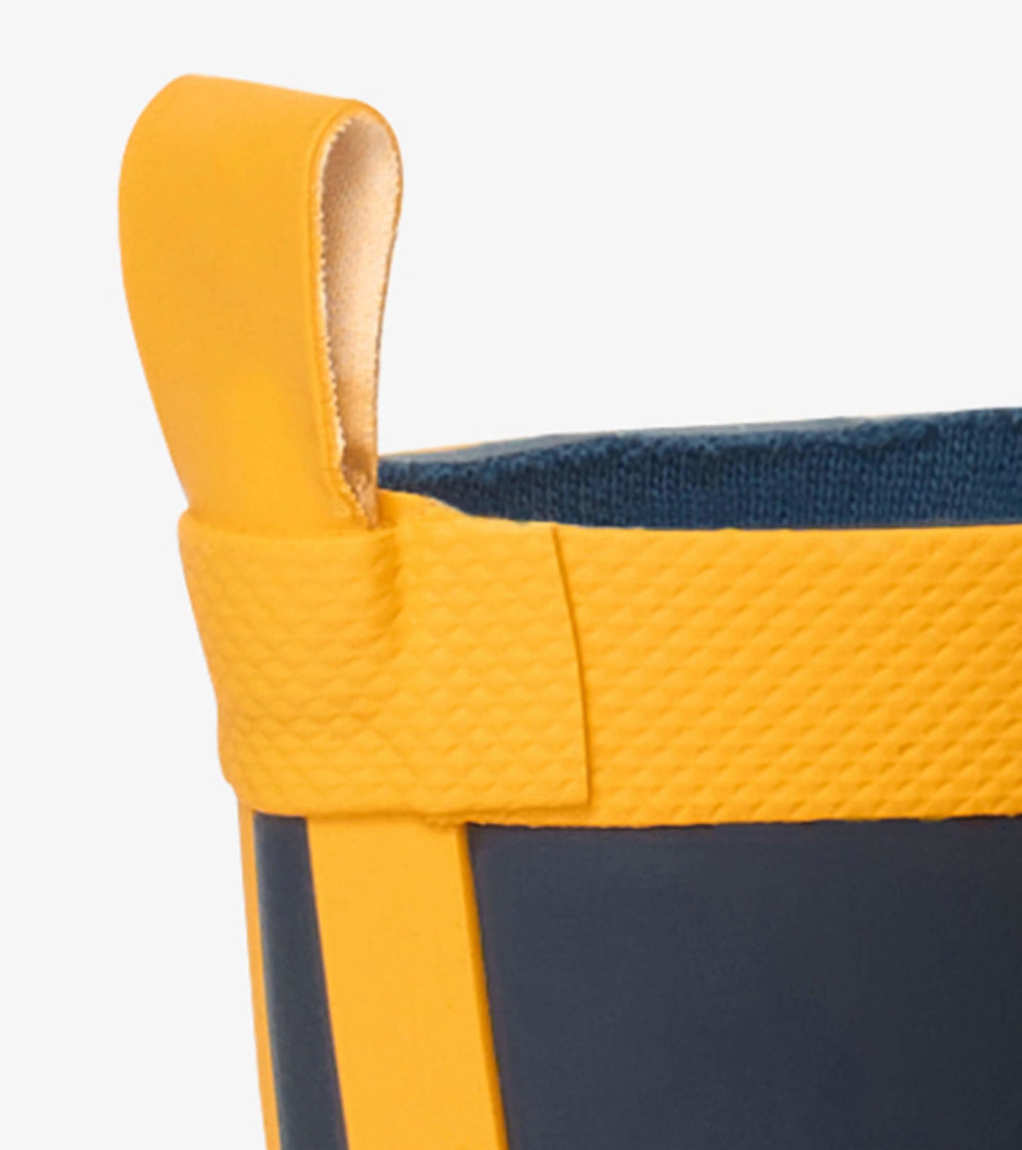 Navy and yellow matte rain boot featuring a textured yellow top and a pull tab for easy wear.