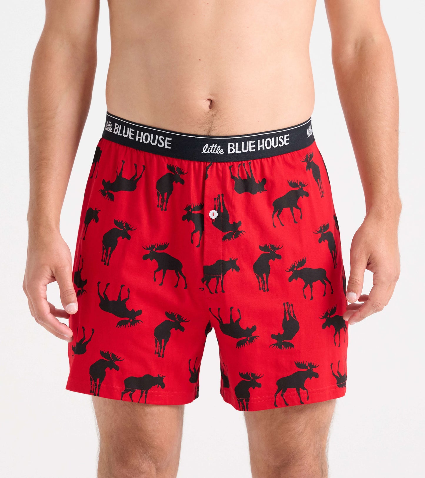 Red men's boxer shorts featuring a black moose pattern and a comfortable waistband.